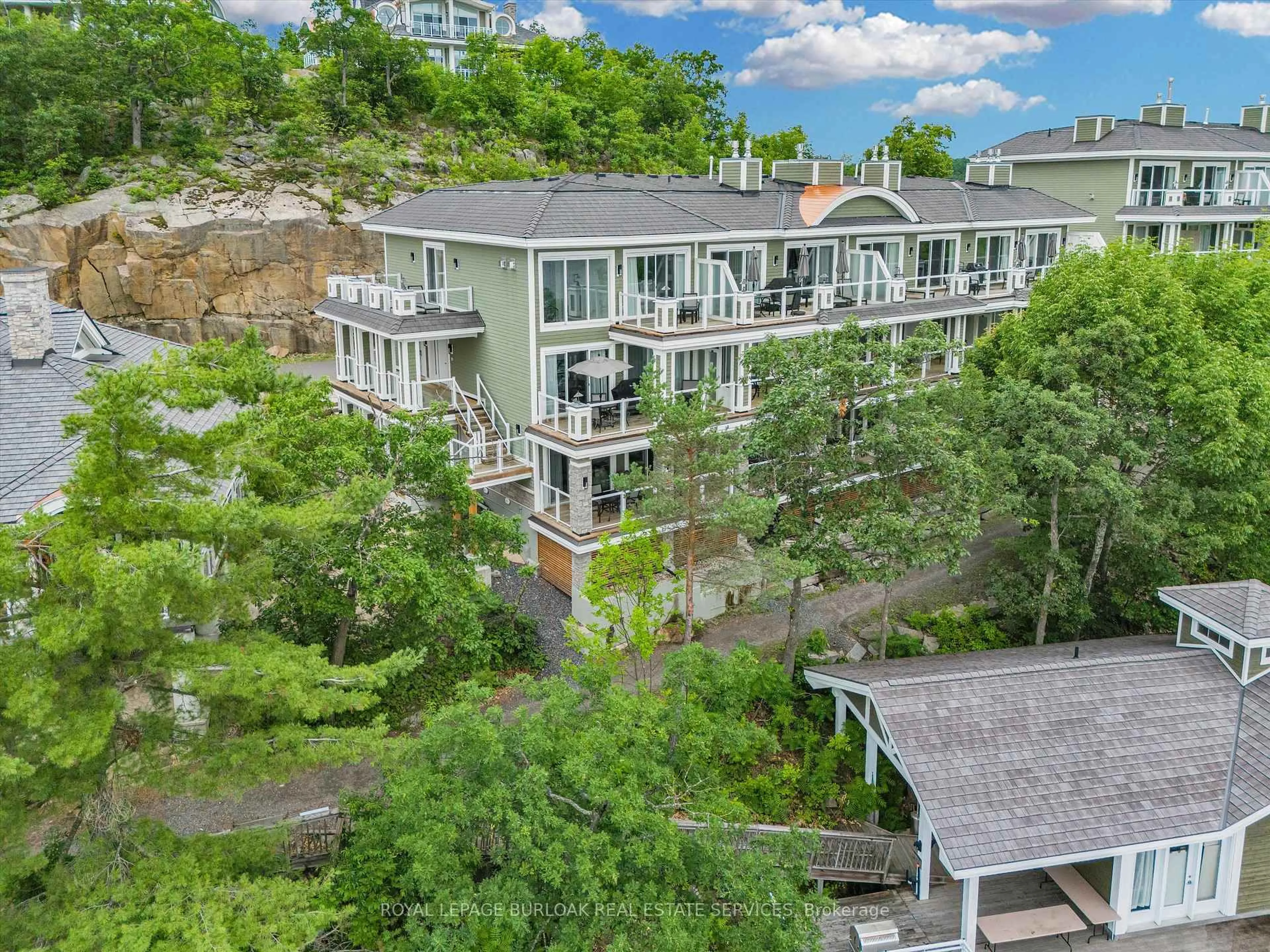 A pic from outside/outdoor area/front of a property/back of a property/a pic from drone, city buildings view from balcony for 1869 Muskoka 118 Rd #BTW -101, Muskoka Lakes Ontario P1L 1W8