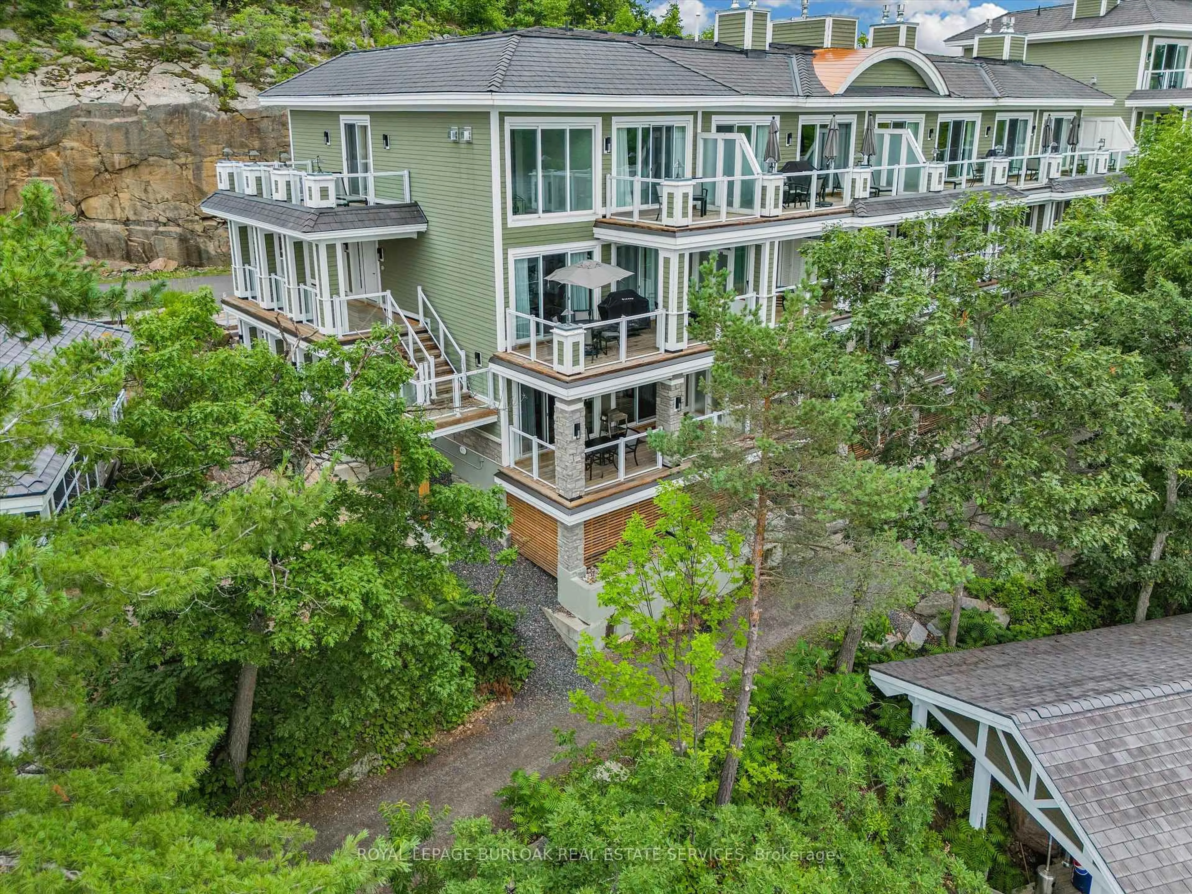A pic from outside/outdoor area/front of a property/back of a property/a pic from drone, water/lake/river/ocean view for 1869 Muskoka 118 Rd #BTW -101, Muskoka Lakes Ontario P1L 1W8