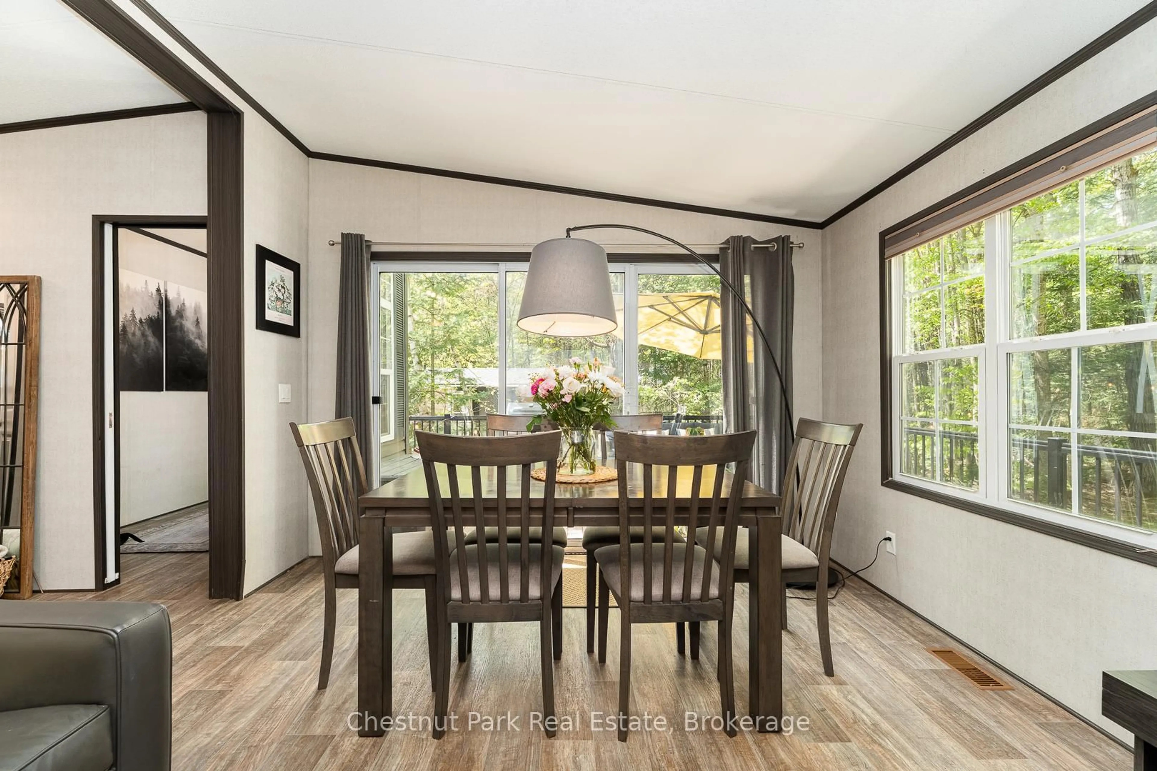 Dining room, wood/laminate floor for 1047 Bonnie Lake Camp Rd #808, Bracebridge Ontario P1L 1W9