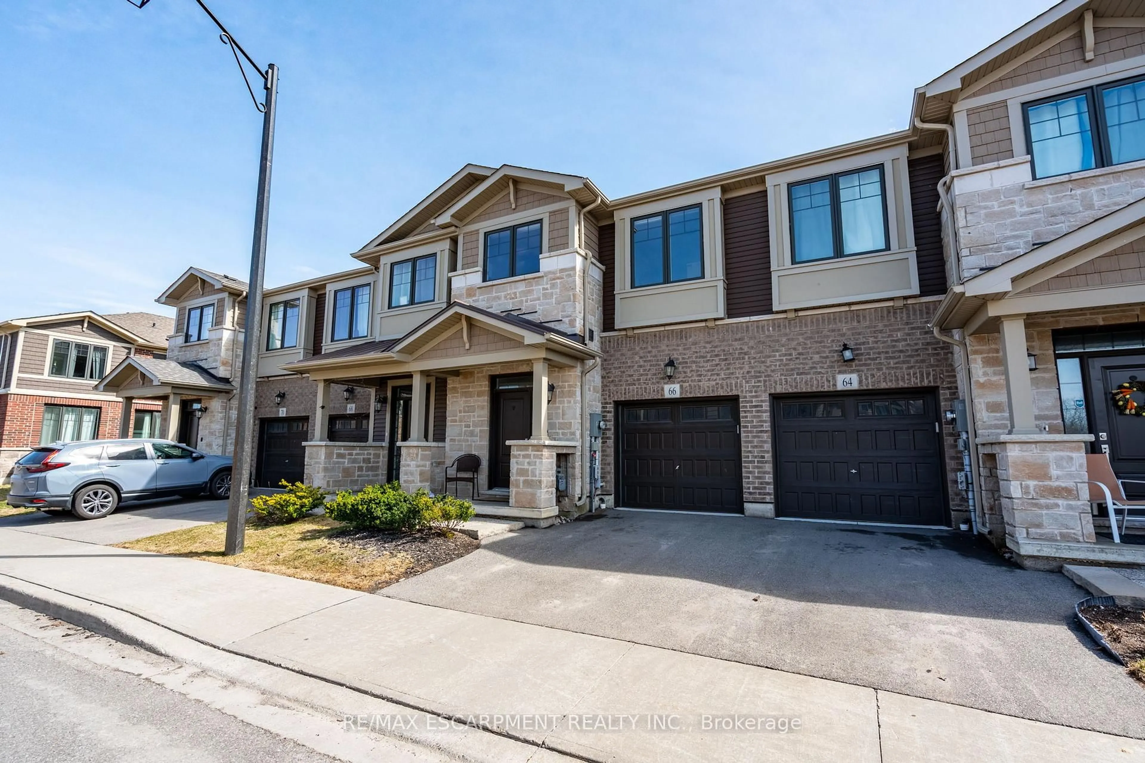 Home with brick exterior material, street for 66 Pelican Lane, Hamilton Ontario L8K 0A4