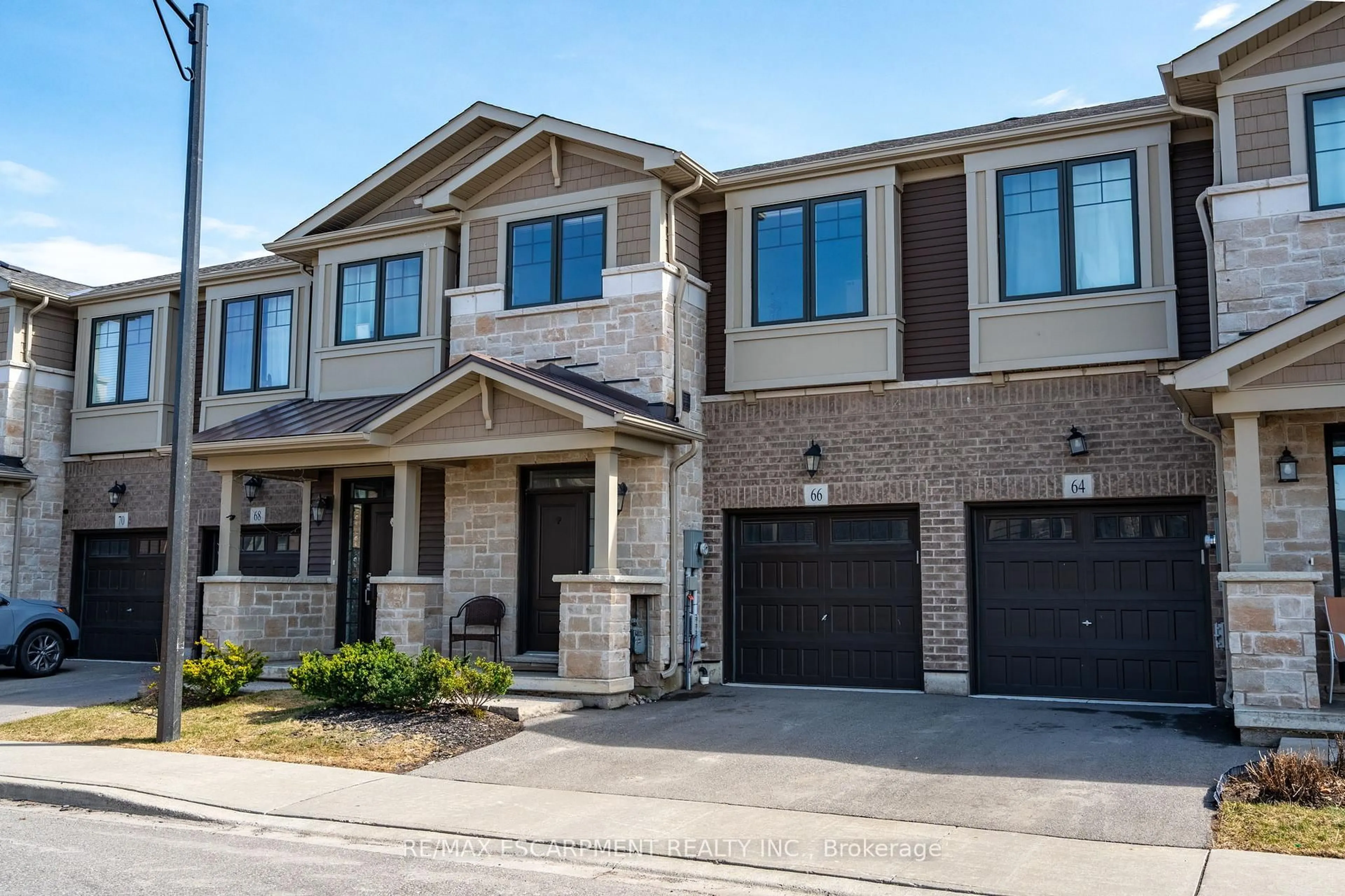 Home with brick exterior material, street for 66 Pelican Lane, Hamilton Ontario L8K 0A4