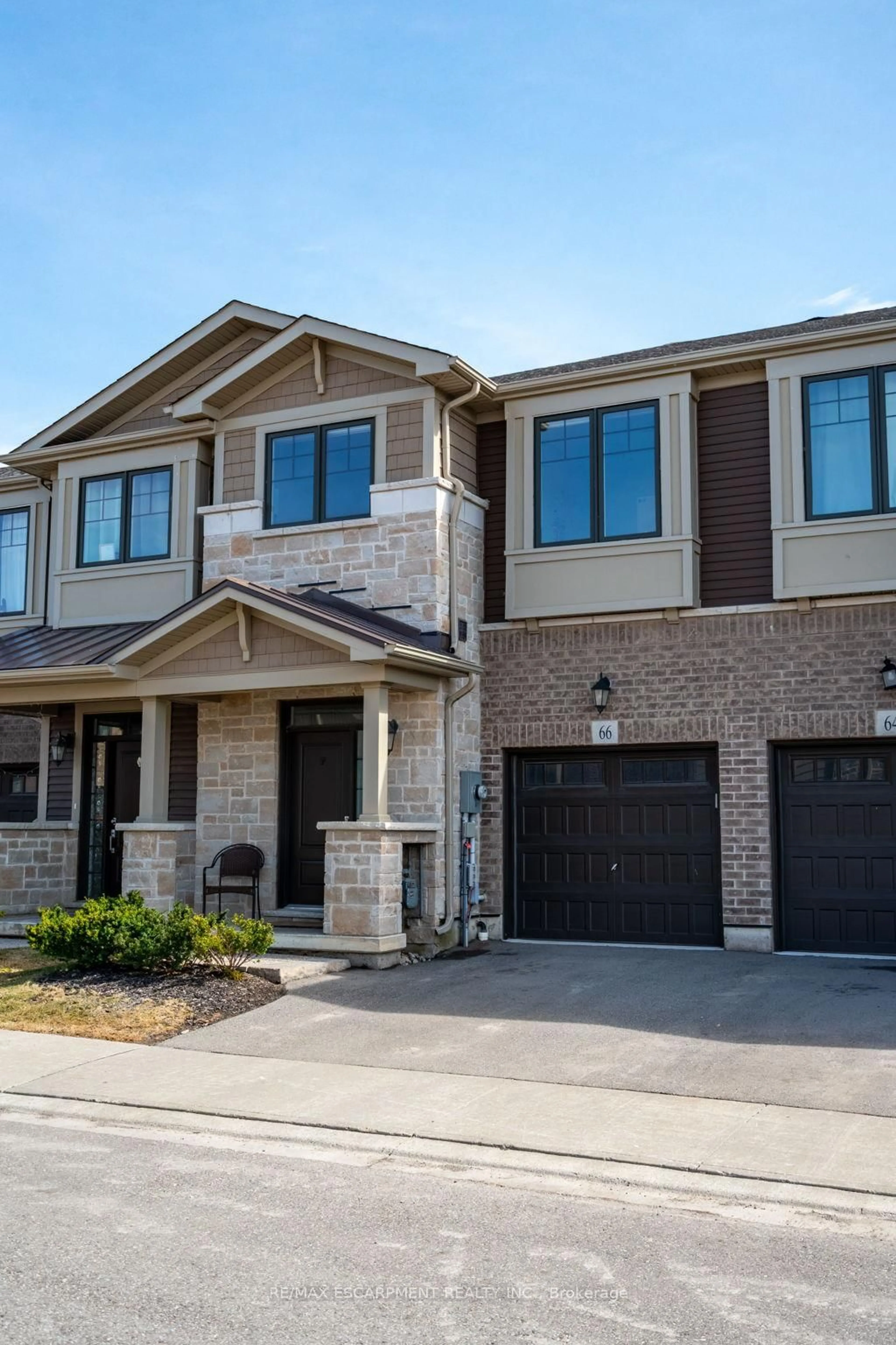 Home with brick exterior material, street for 66 Pelican Lane, Hamilton Ontario L8K 0A4