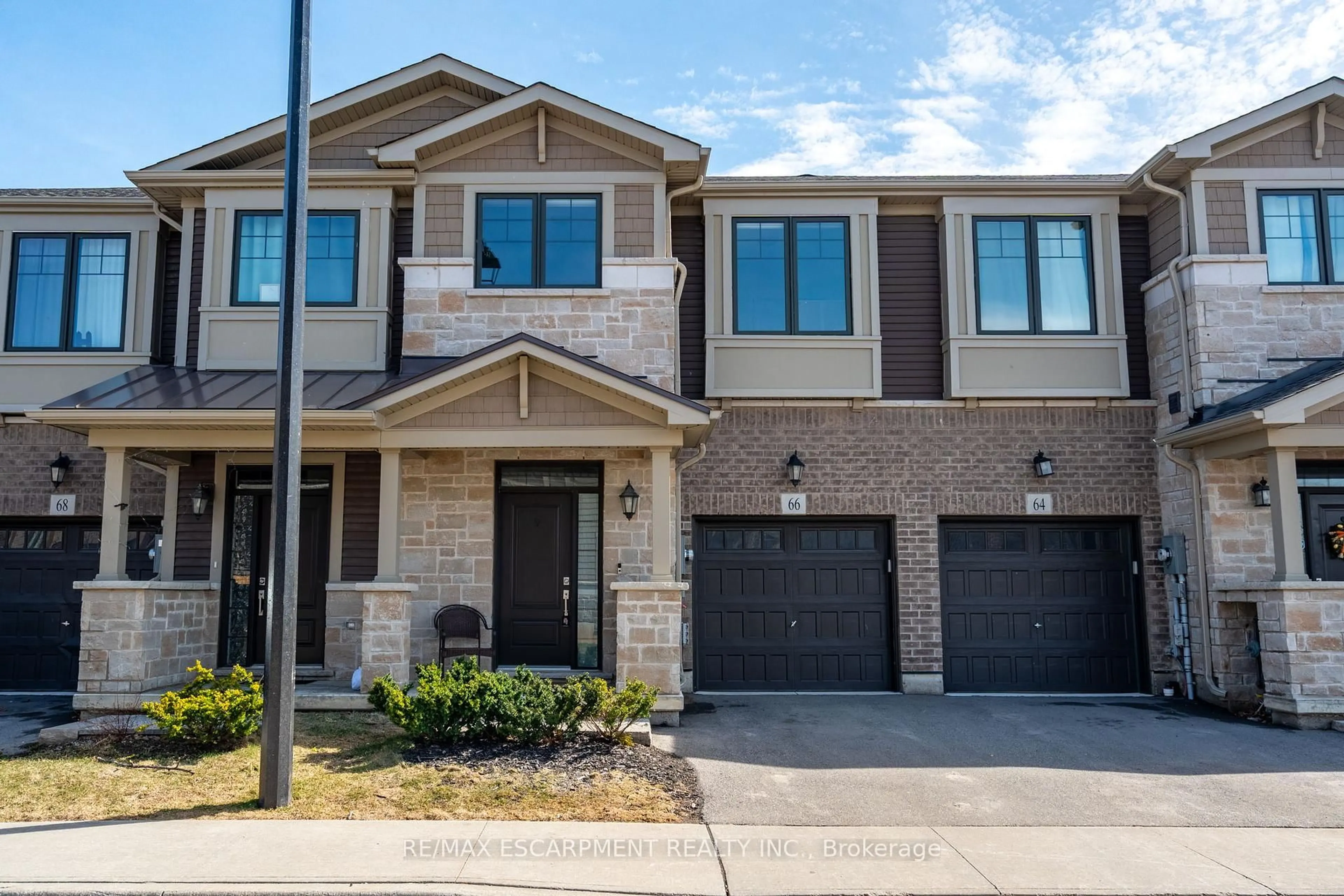 Home with brick exterior material, street for 66 Pelican Lane, Hamilton Ontario L8K 0A4
