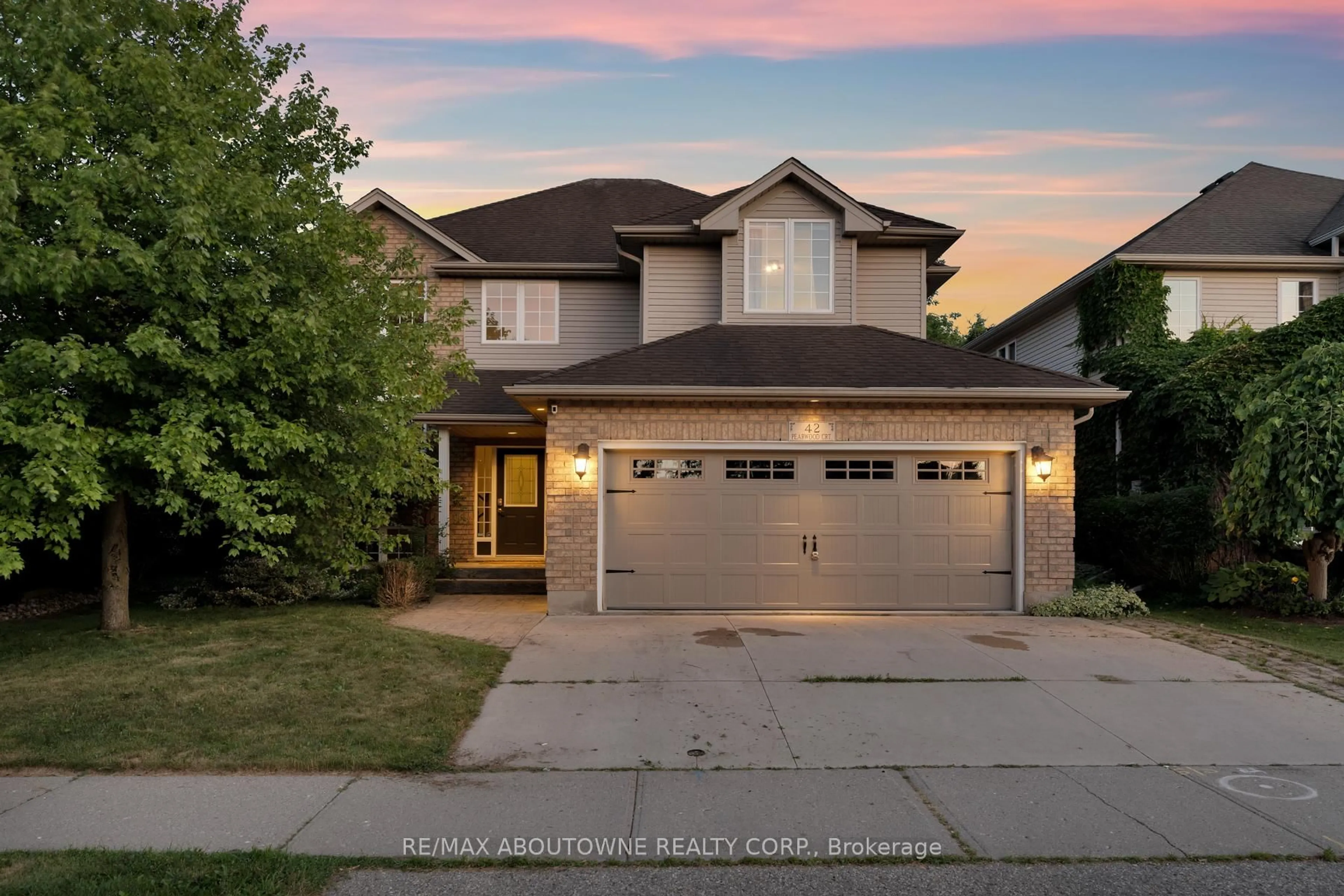 Home with brick exterior material, street for 42 Pearwood Crt, Kitchener Ontario N2P 2L1
