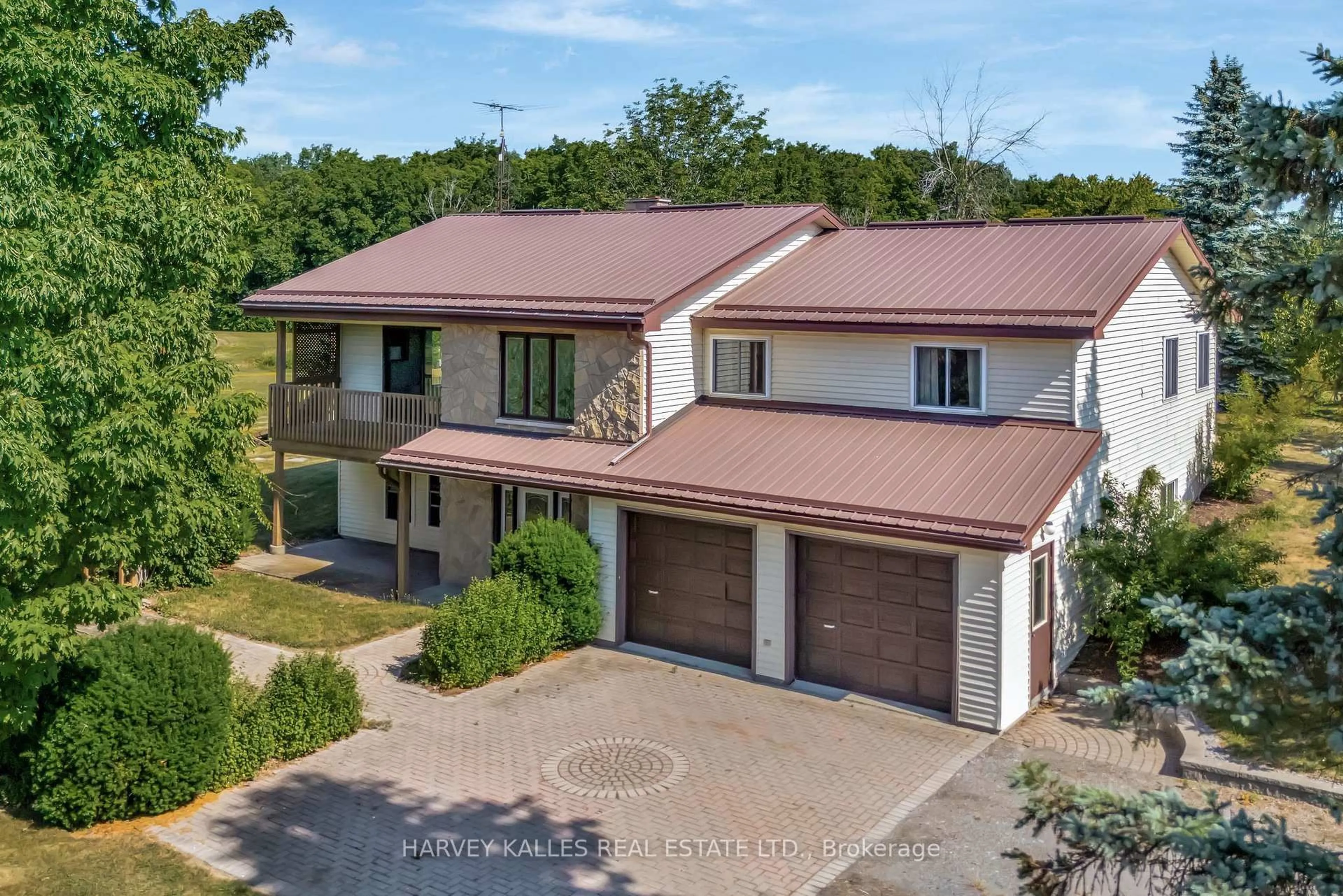A pic from outside/outdoor area/front of a property/back of a property/a pic from drone, street for 1015 County 2 Rd, Prince Edward County Ontario K0K 2J0