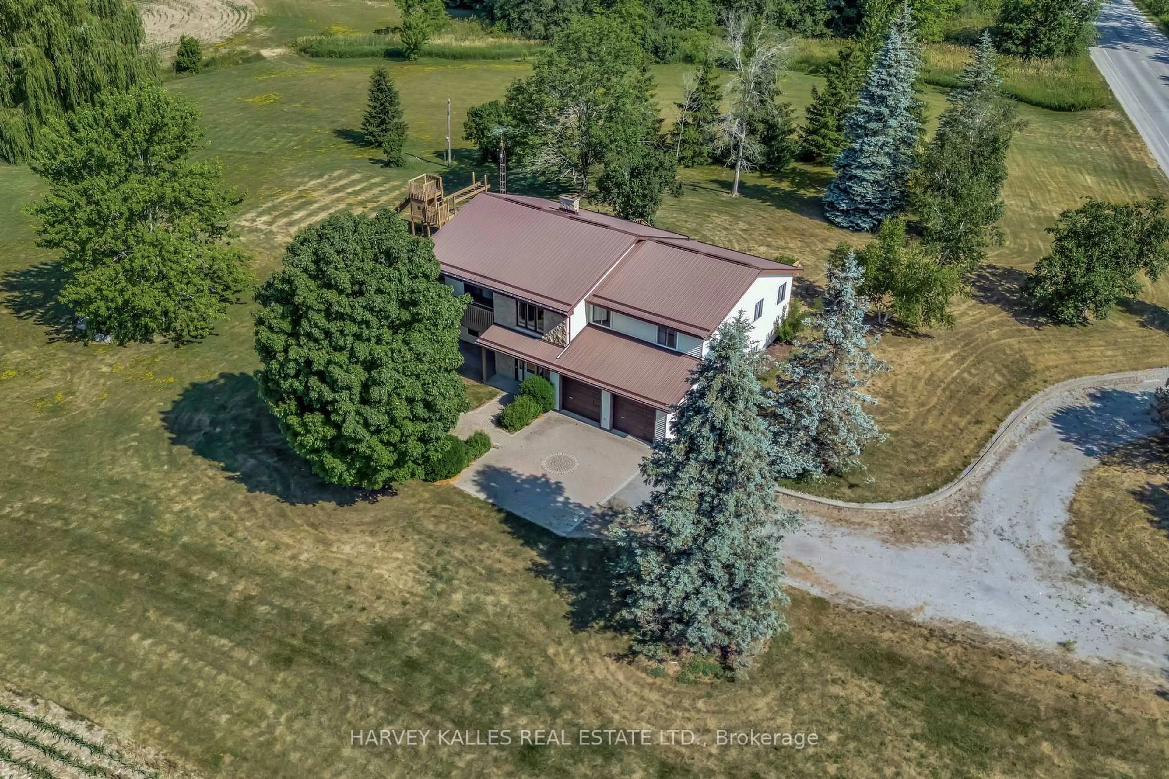 A pic from outside/outdoor area/front of a property/back of a property/a pic from drone, unknown for 1015 County 2 Rd, Prince Edward County Ontario K0K 2J0
