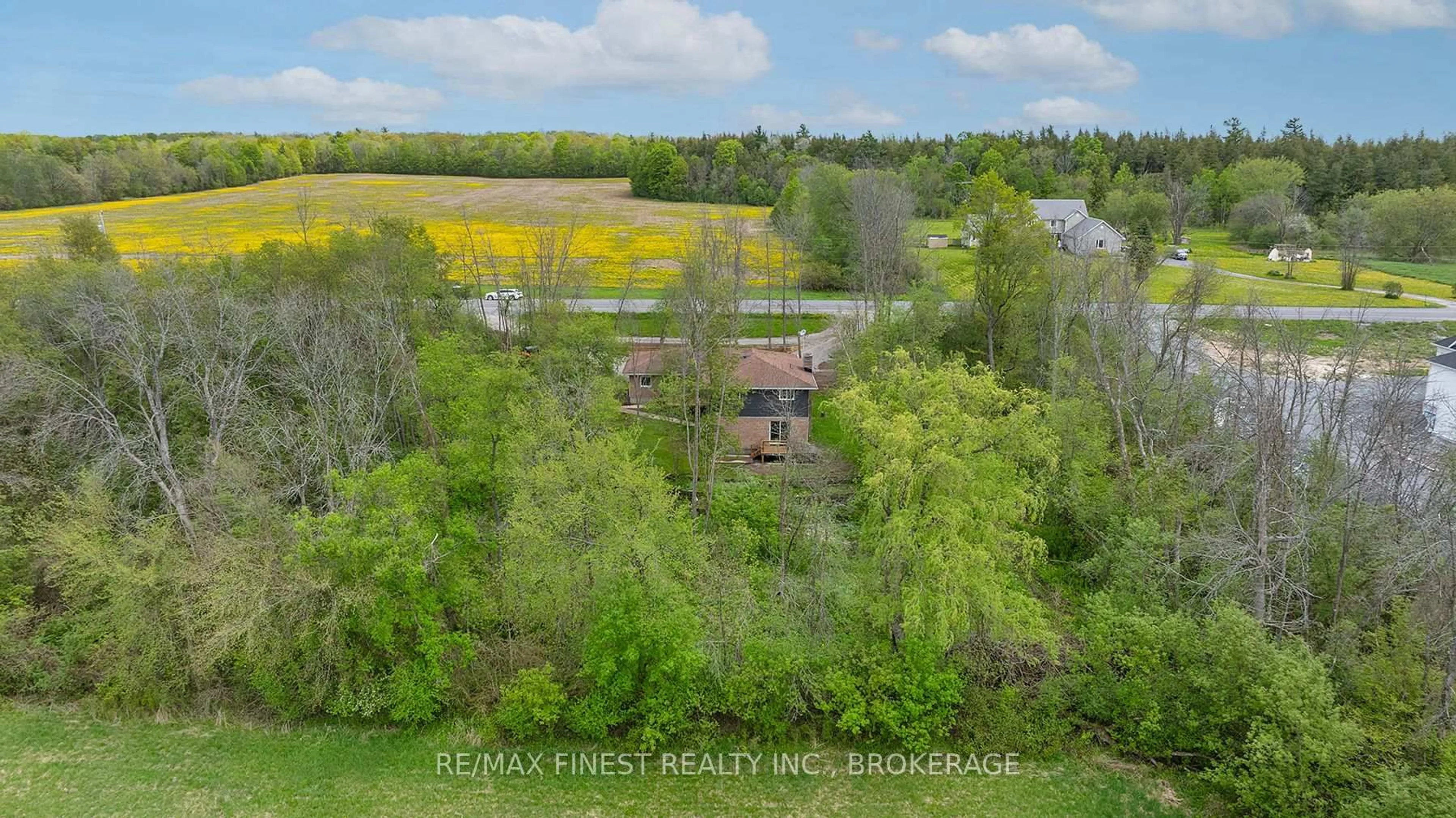 A pic from outside/outdoor area/front of a property/back of a property/a pic from drone, forest/trees view for 3327 Wilton Rd, Harrowsmith Ontario K0H 1V0