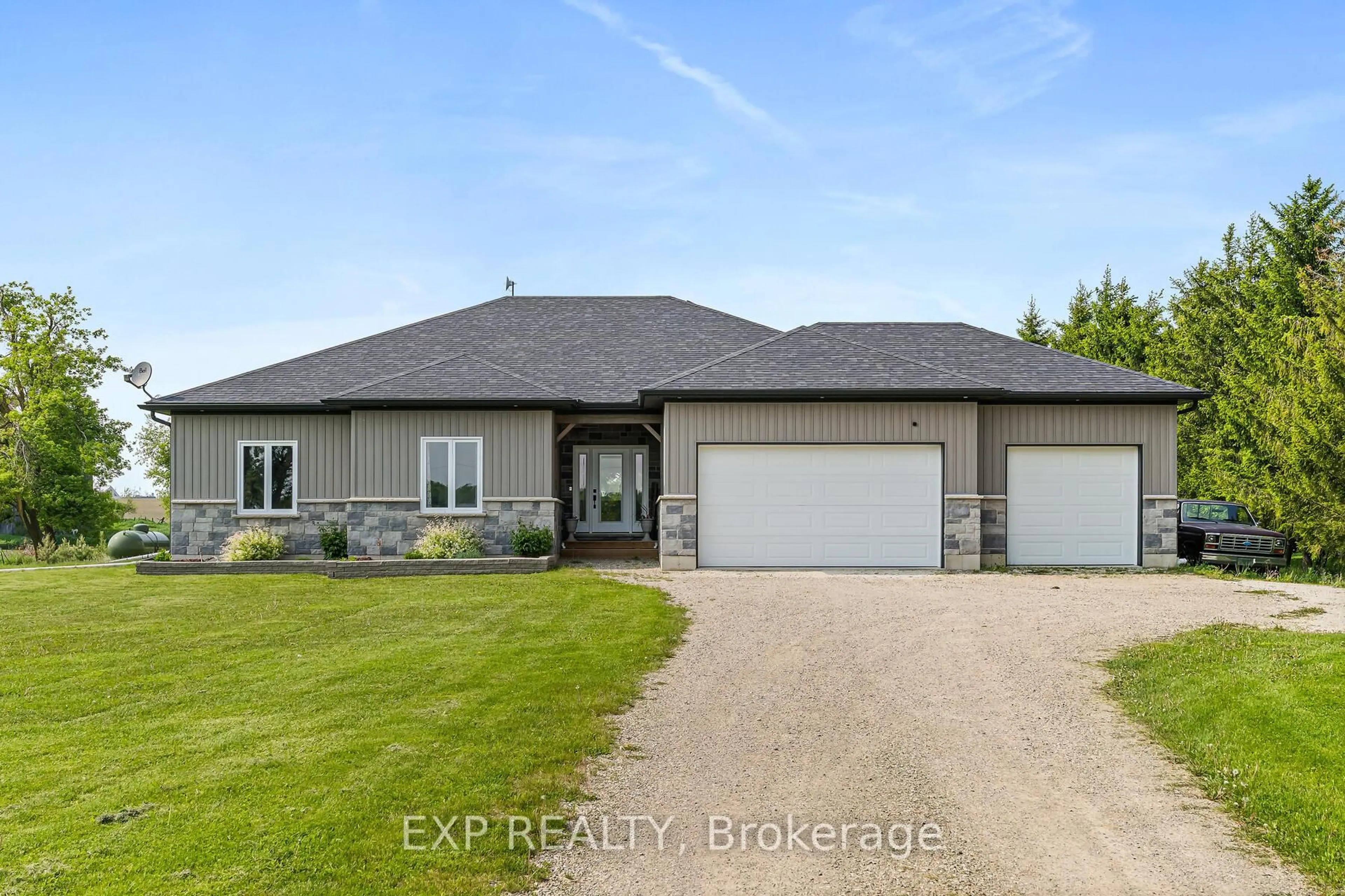 A pic from outside/outdoor area/front of a property/back of a property/a pic from drone, street for 706183 County Rd 21, Mulmur Ontario L9V 0W4