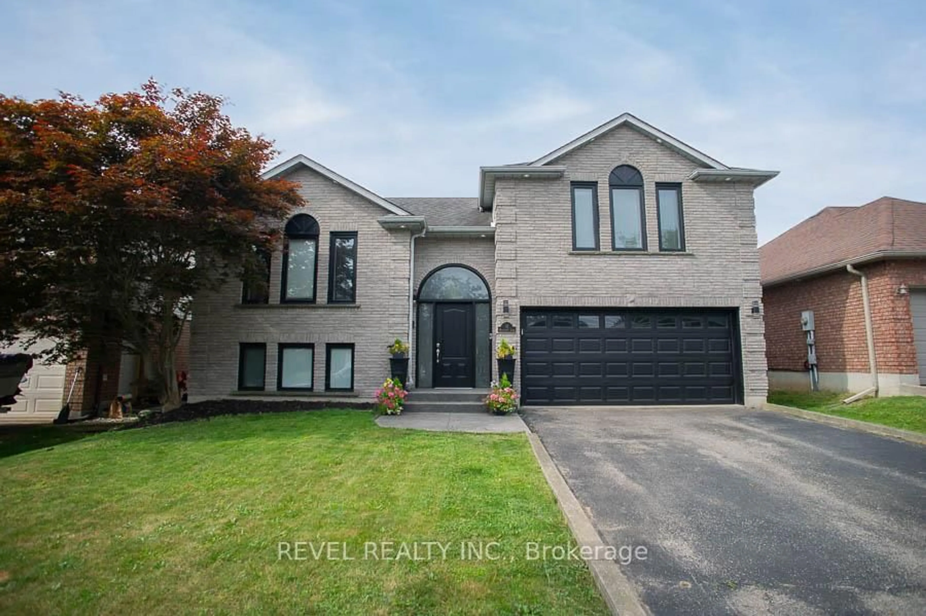 Home with brick exterior material, street for 11 Maplecrest Lane, Brantford Ontario N3R 7V1