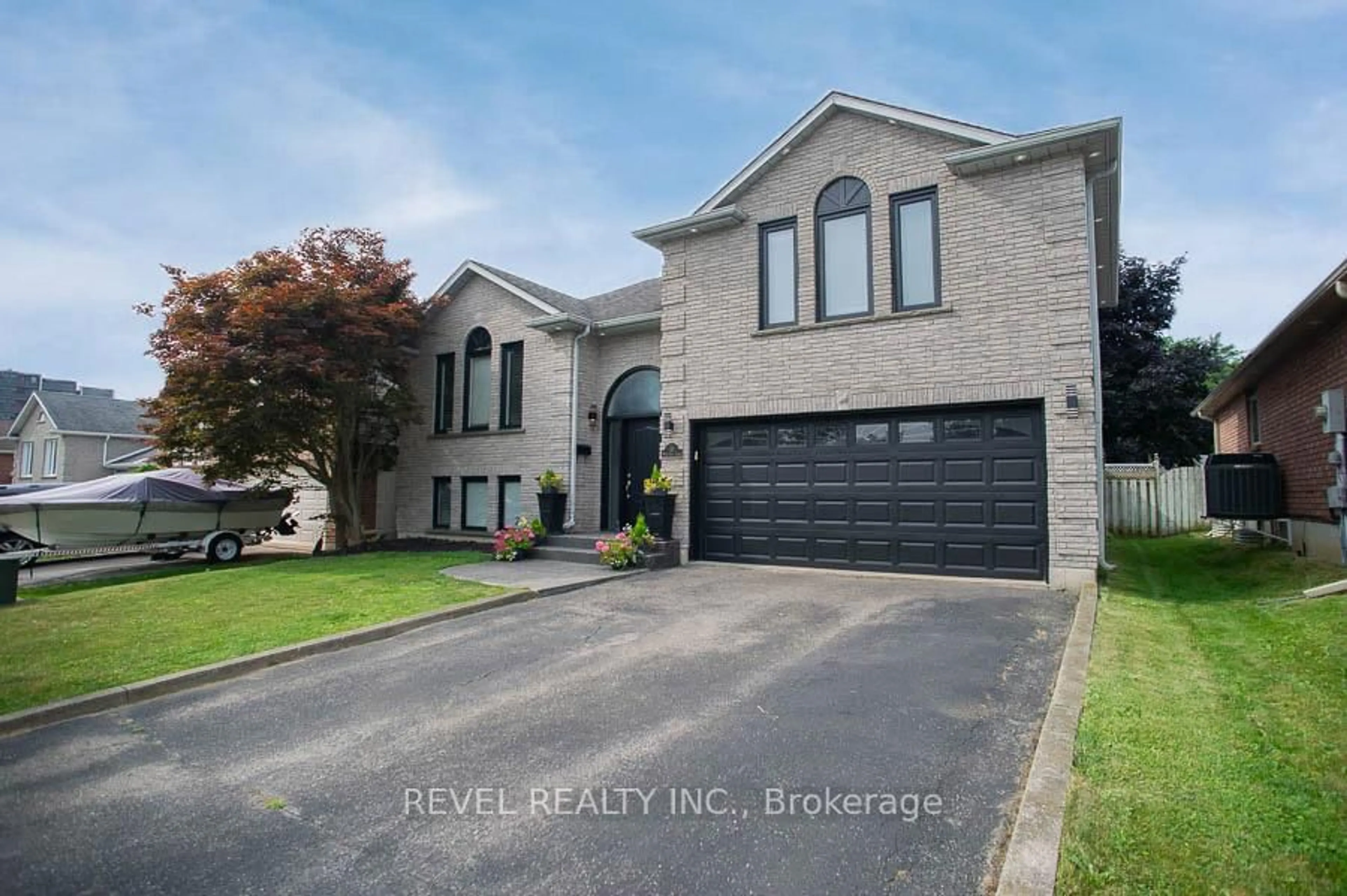 Home with brick exterior material, street for 11 Maplecrest Lane, Brantford Ontario N3R 7V1