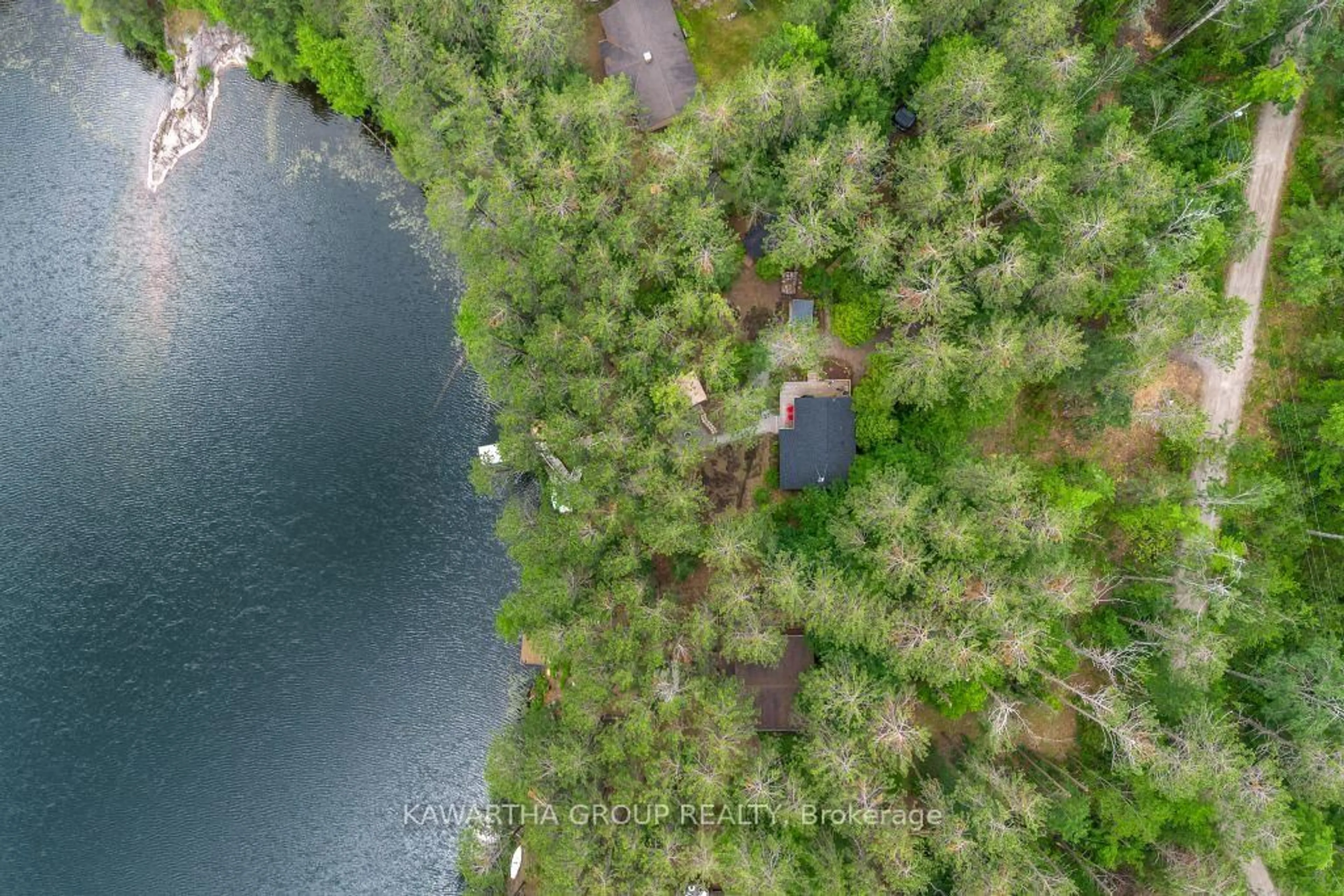 A pic from outside/outdoor area/front of a property/back of a property/a pic from drone, water/lake/river/ocean view for 1339 Spar Lake Rd, Minden Hills Ontario K0M 2L1