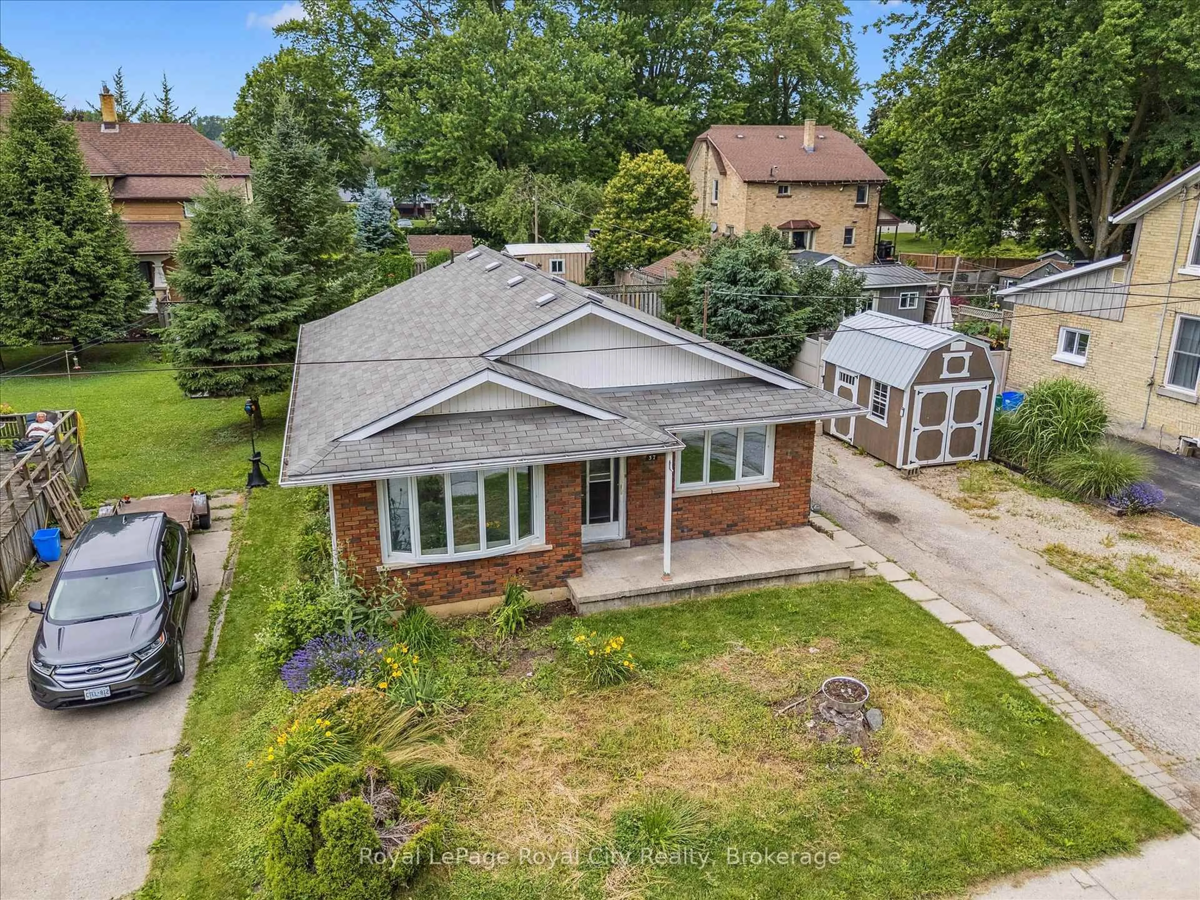 A pic from outside/outdoor area/front of a property/back of a property/a pic from drone, street for 37 Marklane St, Minto Ontario N0G 1Z0