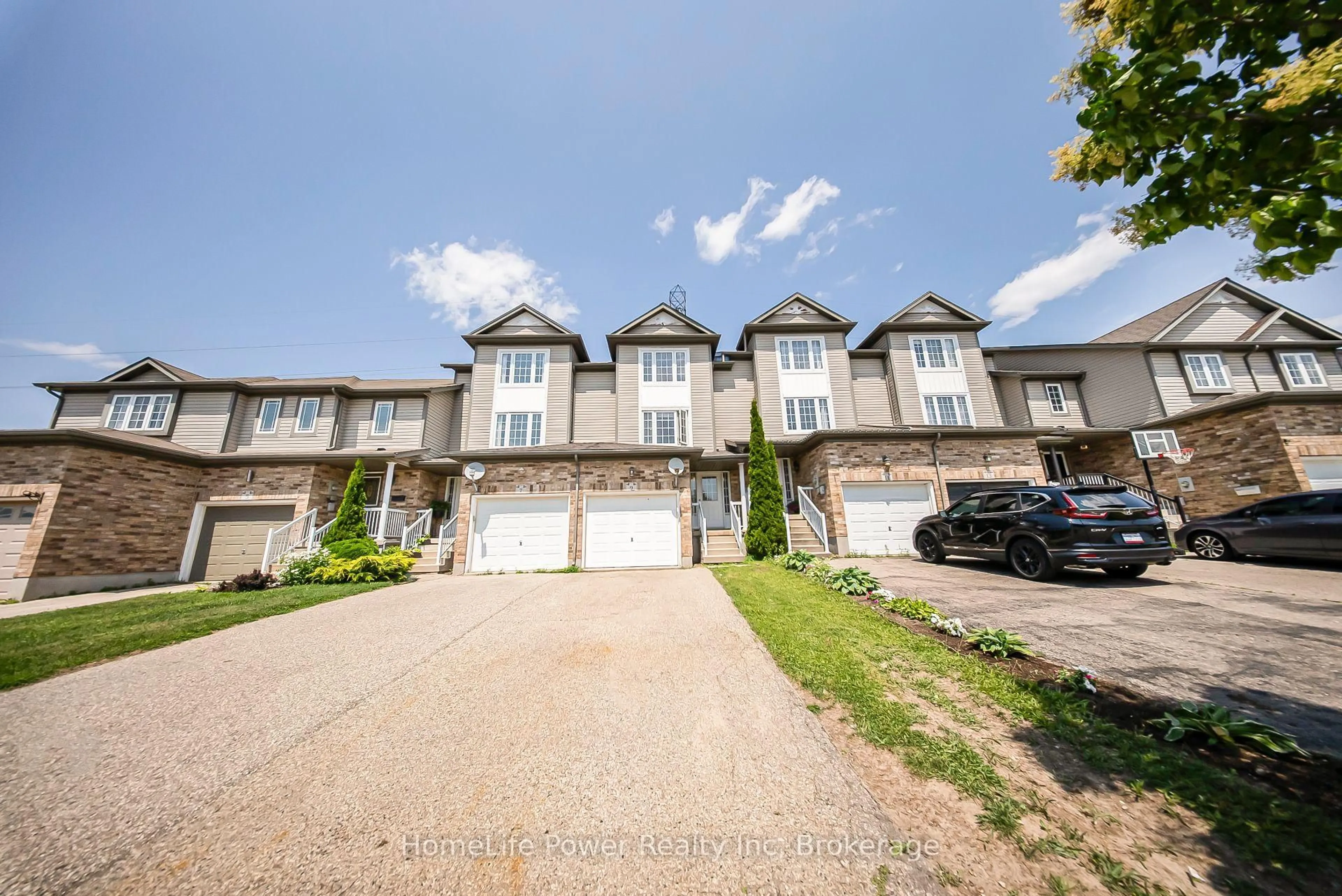 A pic from outside/outdoor area/front of a property/back of a property/a pic from drone, street for 9 Red Clover Cres, Kitchener Ontario N2E 4G9