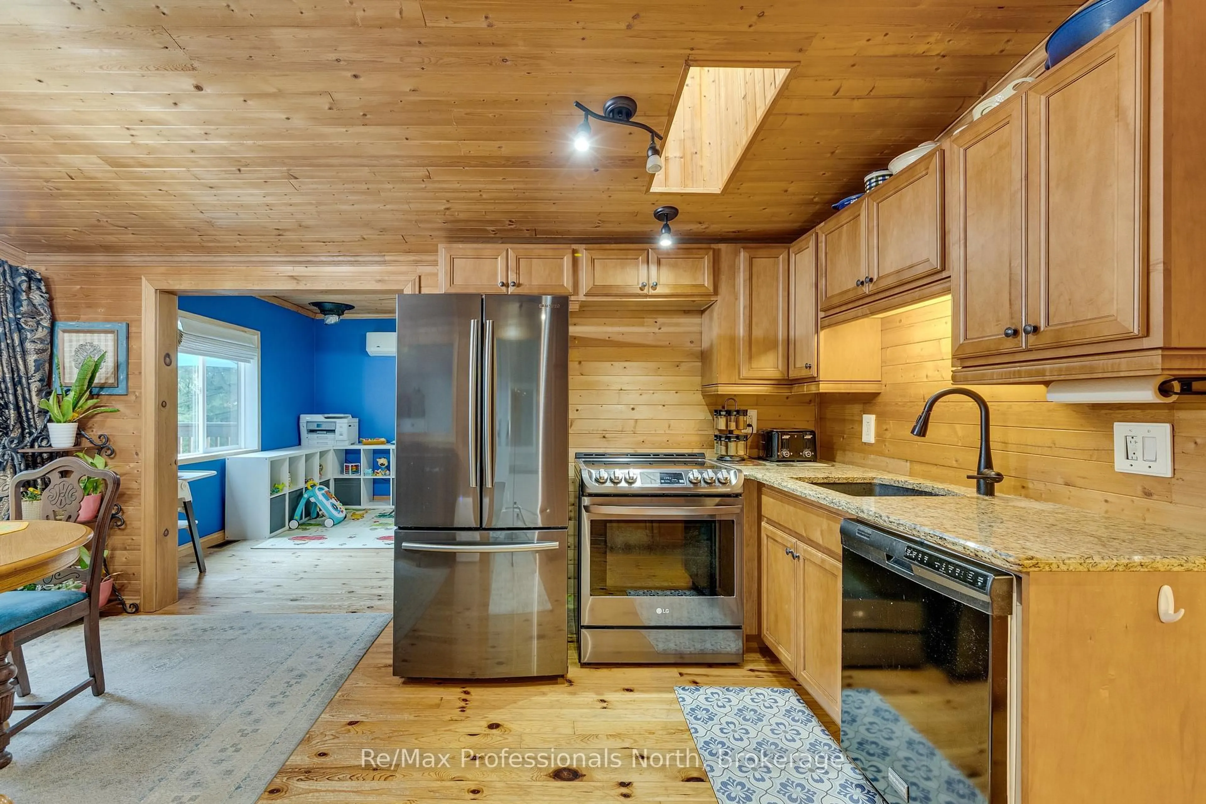 Open concept kitchen, unknown for 1028 Inverness Rd, Muskoka Lakes Ontario P0B 1M0
