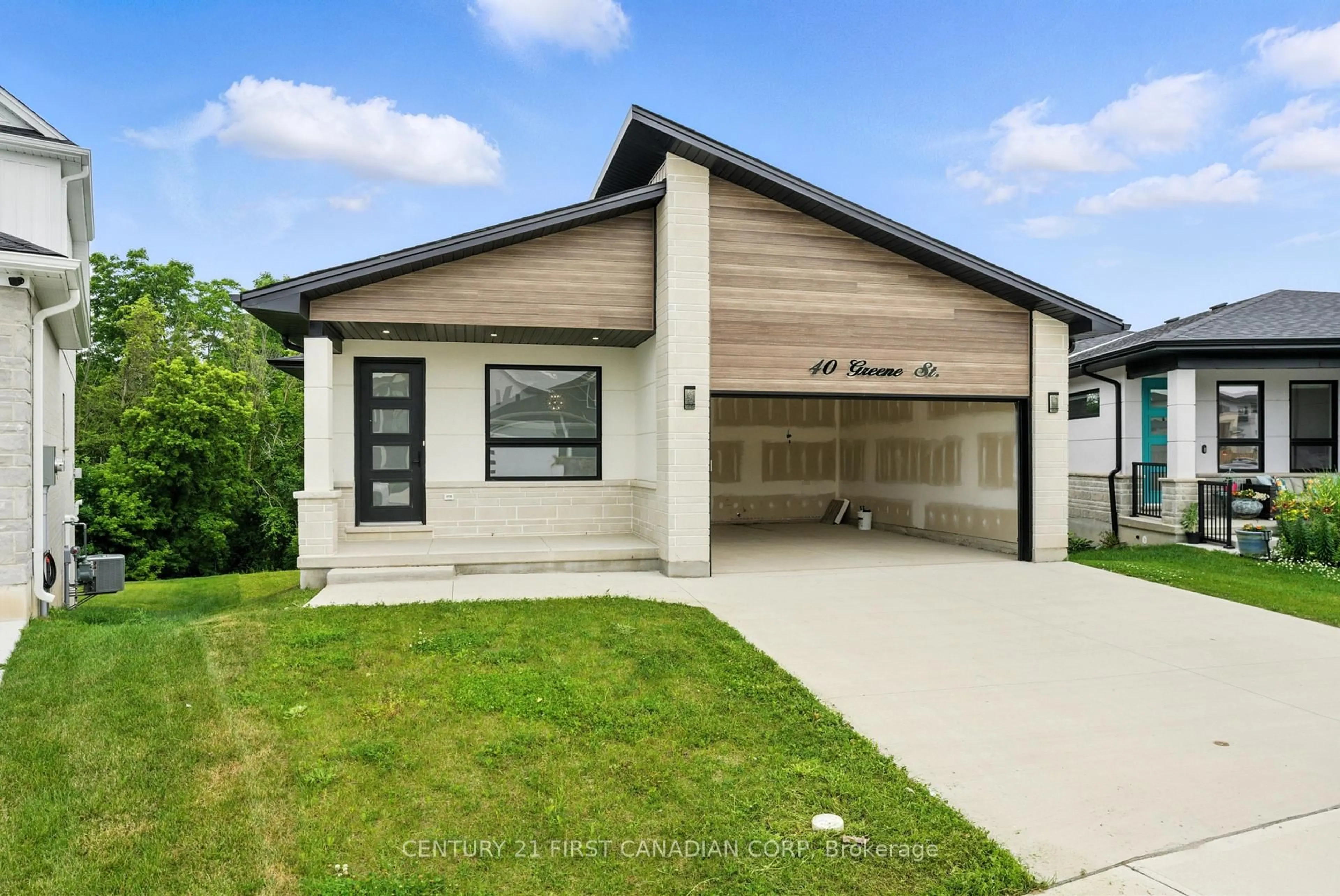 Home with vinyl exterior material, street for 40 Greene St, South Huron Ontario N0M 1S2