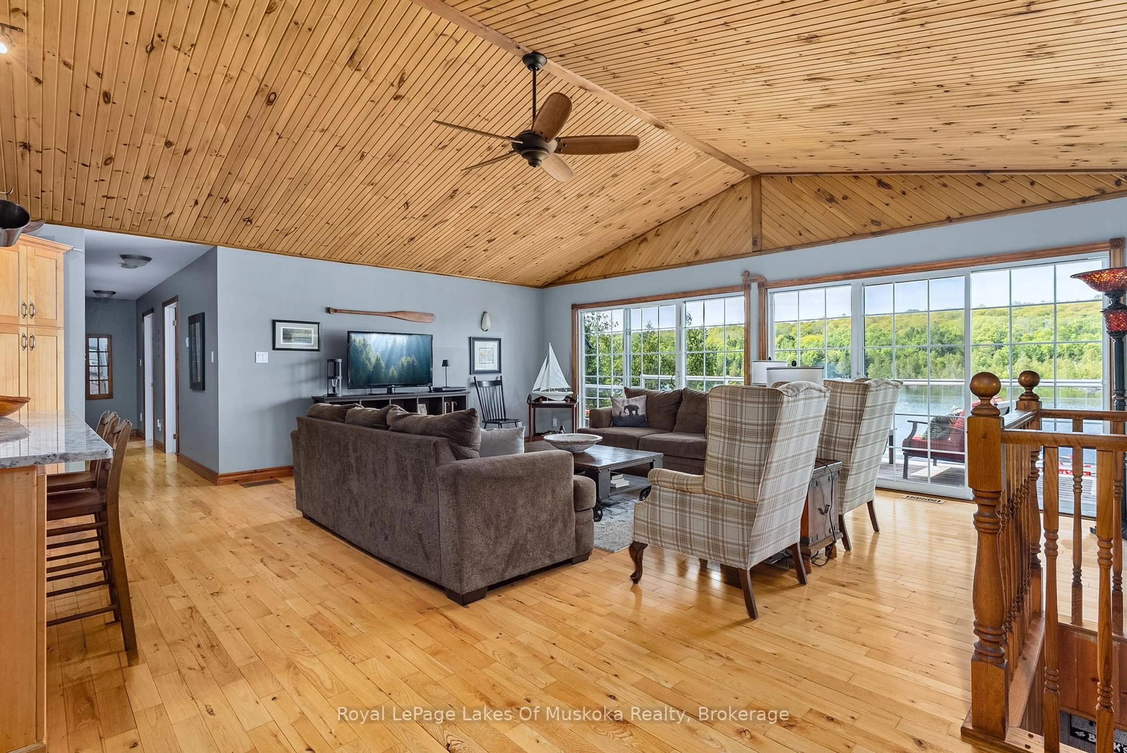Living room with furniture, wood/laminate floor for 300 Wurm Rd, Magnetawan Ontario P0A 1P0