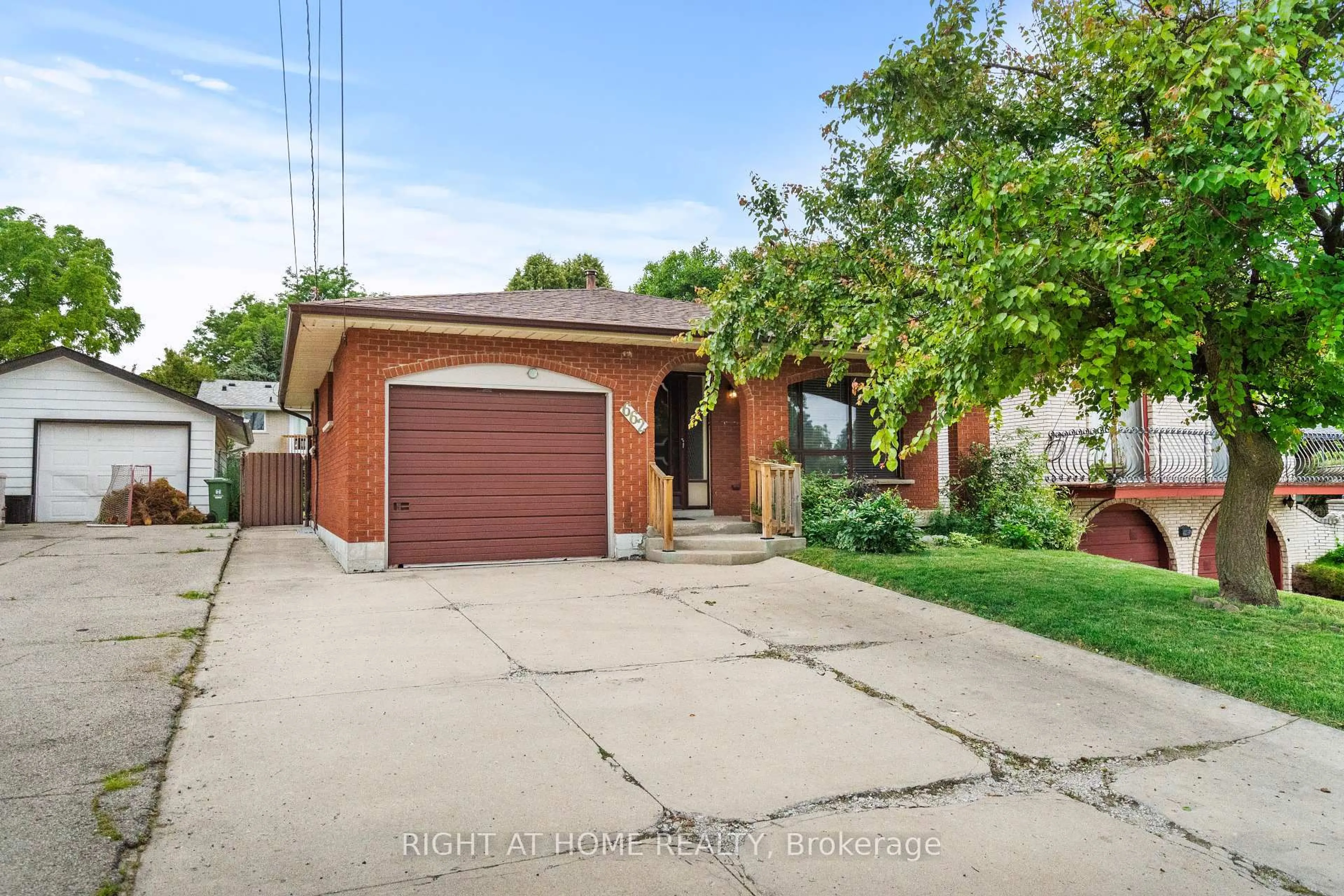Home with brick exterior material, street for 662 West 5th St, Hamilton Ontario L9C 3R2