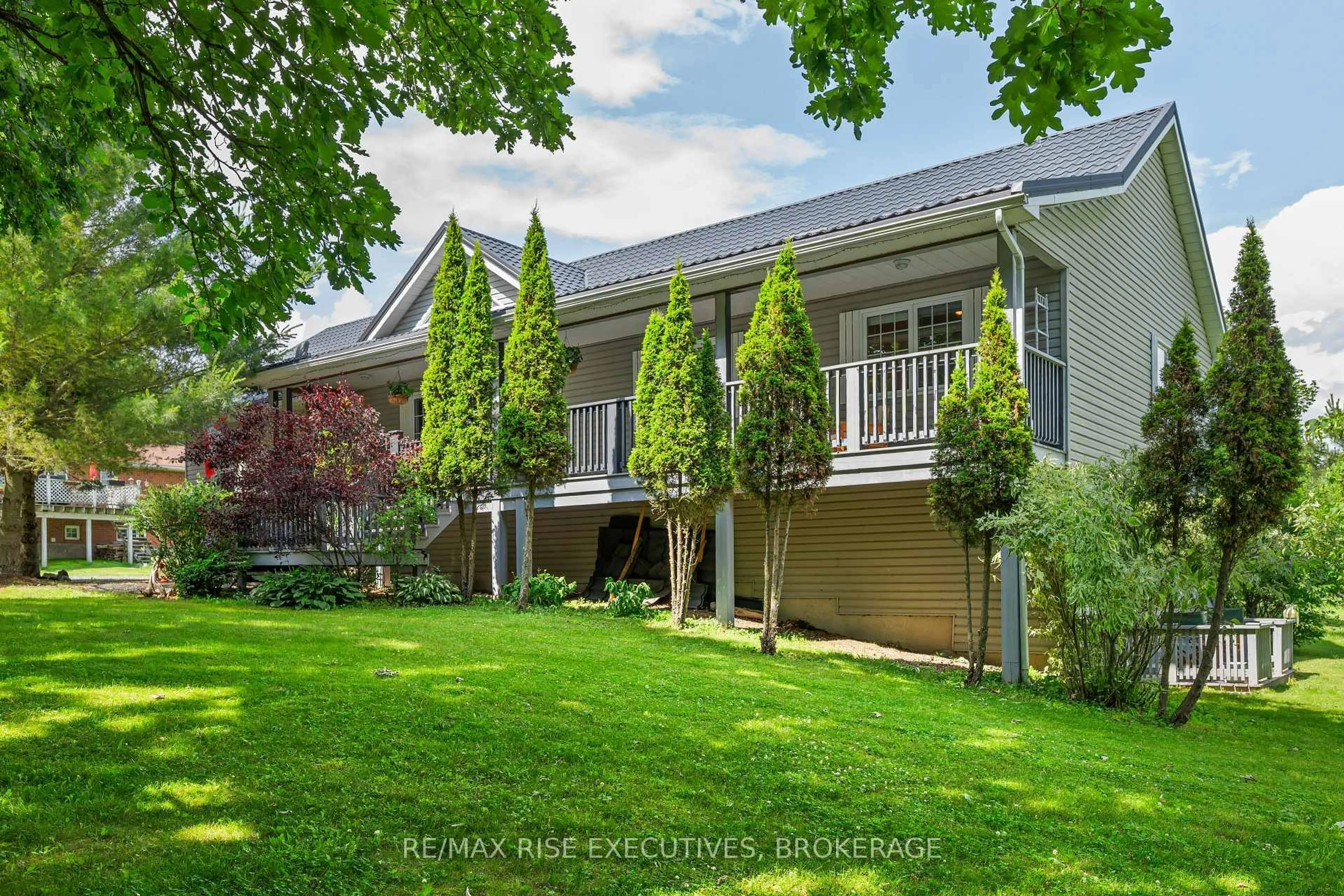 A pic from outside/outdoor area/front of a property/back of a property/a pic from drone, street for 63 Sunnyside Rd, Rideau Lakes Ontario K0G 1X0