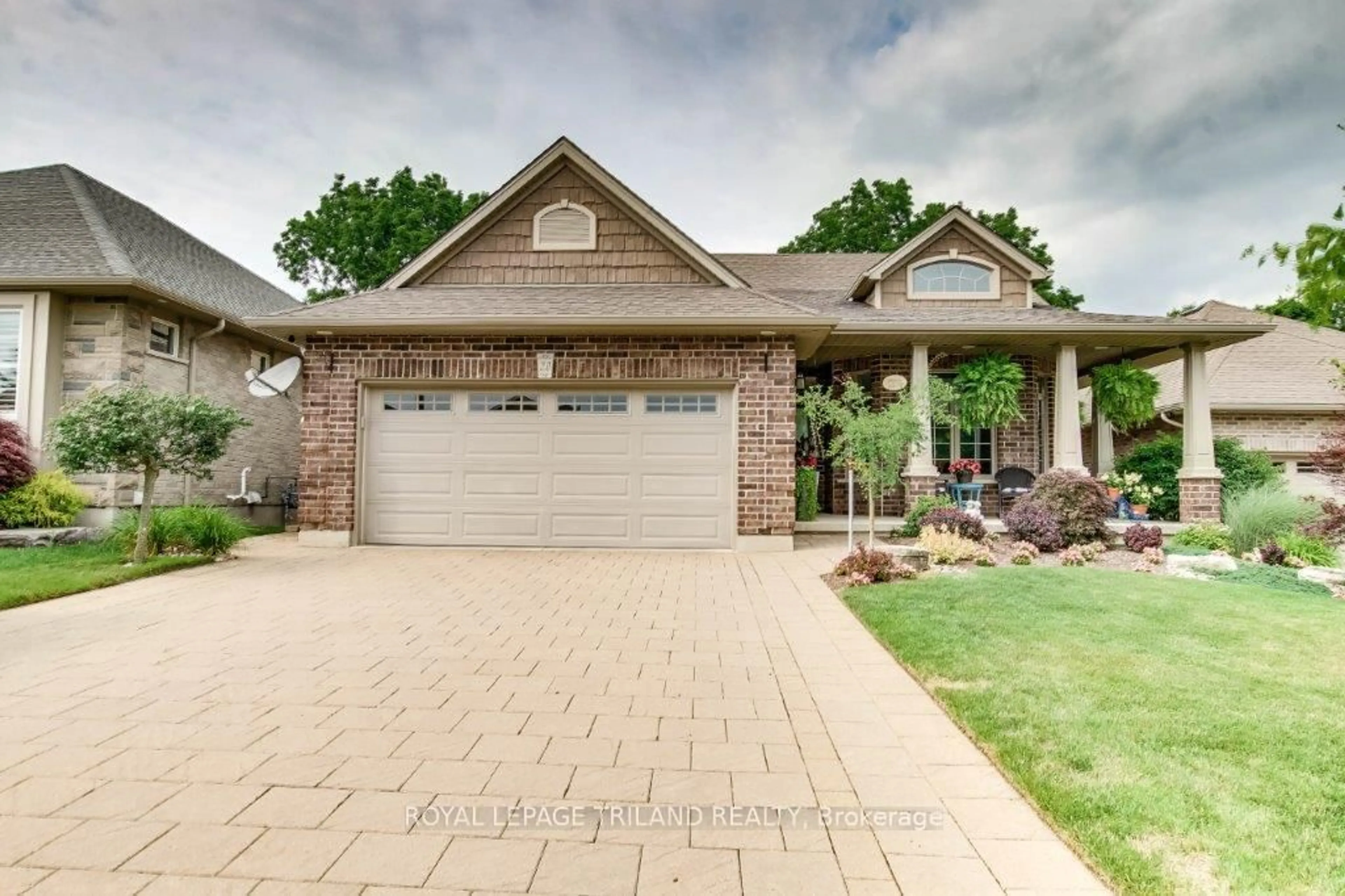 Home with brick exterior material, street for 20 Ensley Pl, Central Elgin Ontario N5L 0A1
