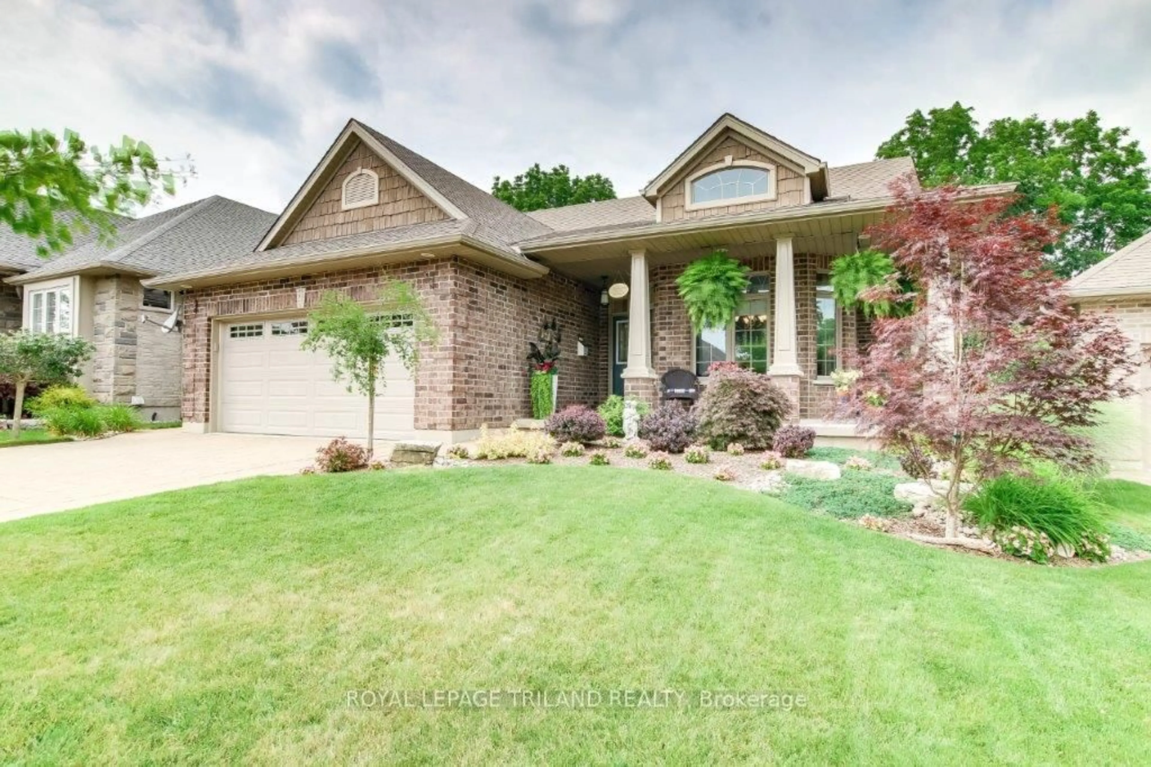 Home with brick exterior material, street for 20 Ensley Pl, Central Elgin Ontario N5L 0A1