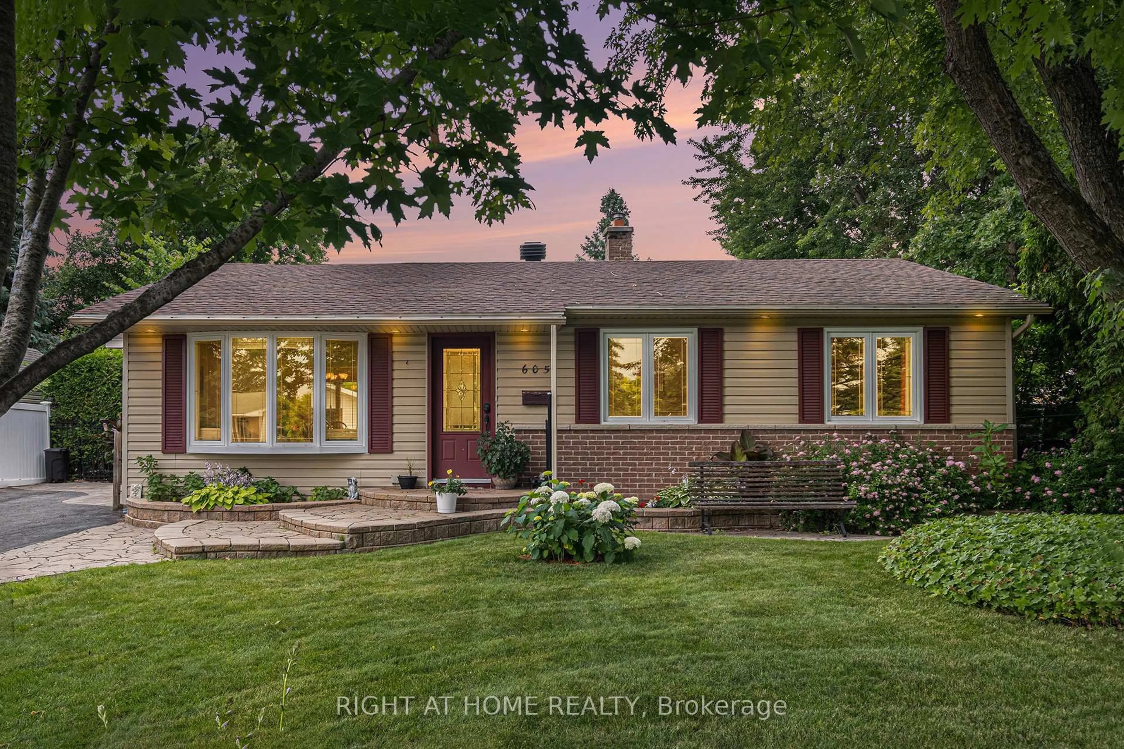 Home with brick exterior material, street for 605 Eastvale Dr, Ottawa Ontario K1J 6Z4