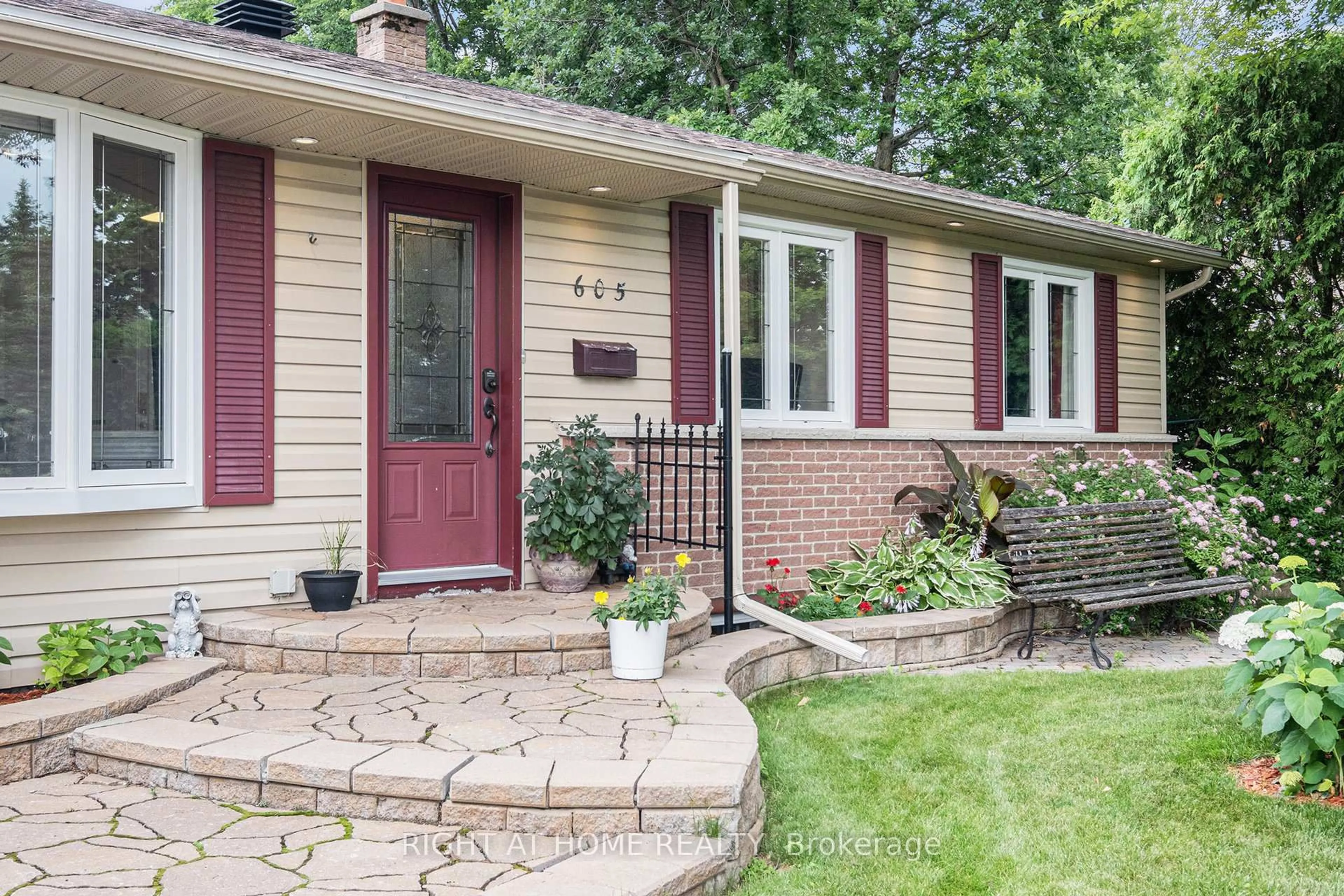 Home with brick exterior material, street for 605 Eastvale Dr, Ottawa Ontario K1J 6Z4