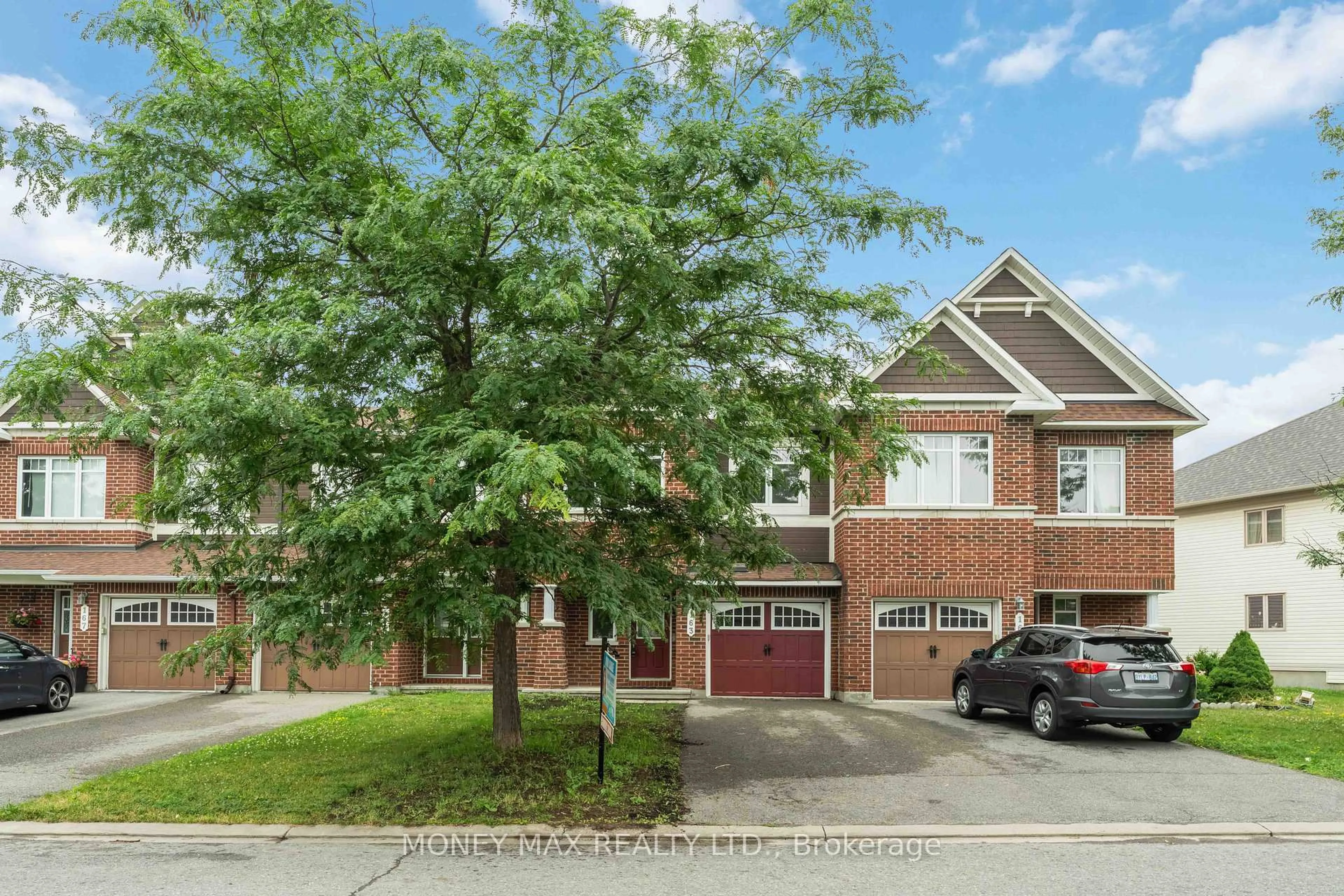 Home with brick exterior material, street for 163 Garrity Cres, Ottawa Ontario K2J 3T5