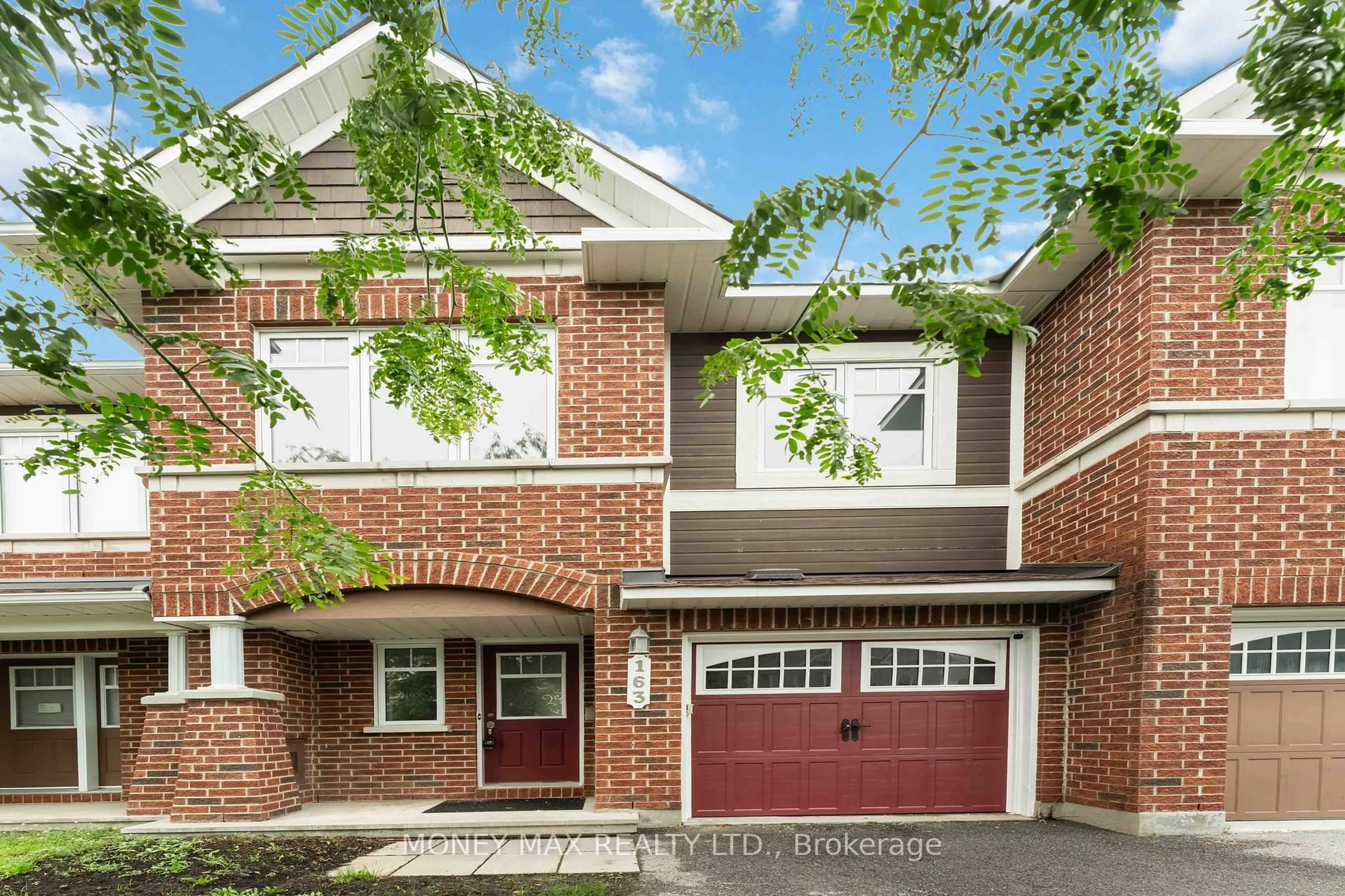 Home with brick exterior material, street for 163 Garrity Cres, Ottawa Ontario K2J 3T5