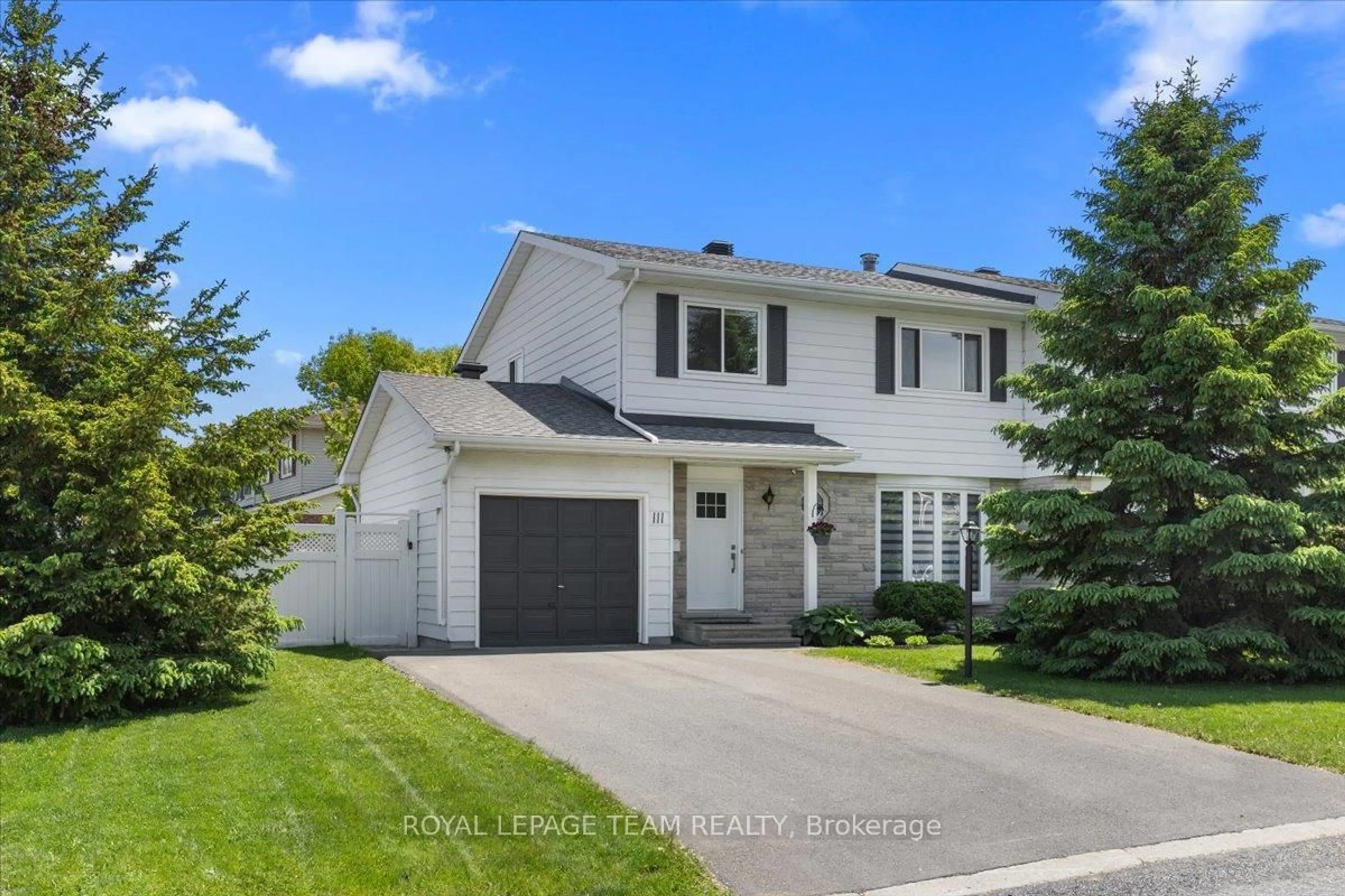 Home with vinyl exterior material, street for 111 Chartwell Ave, Ottawa Ontario K2G 4C6
