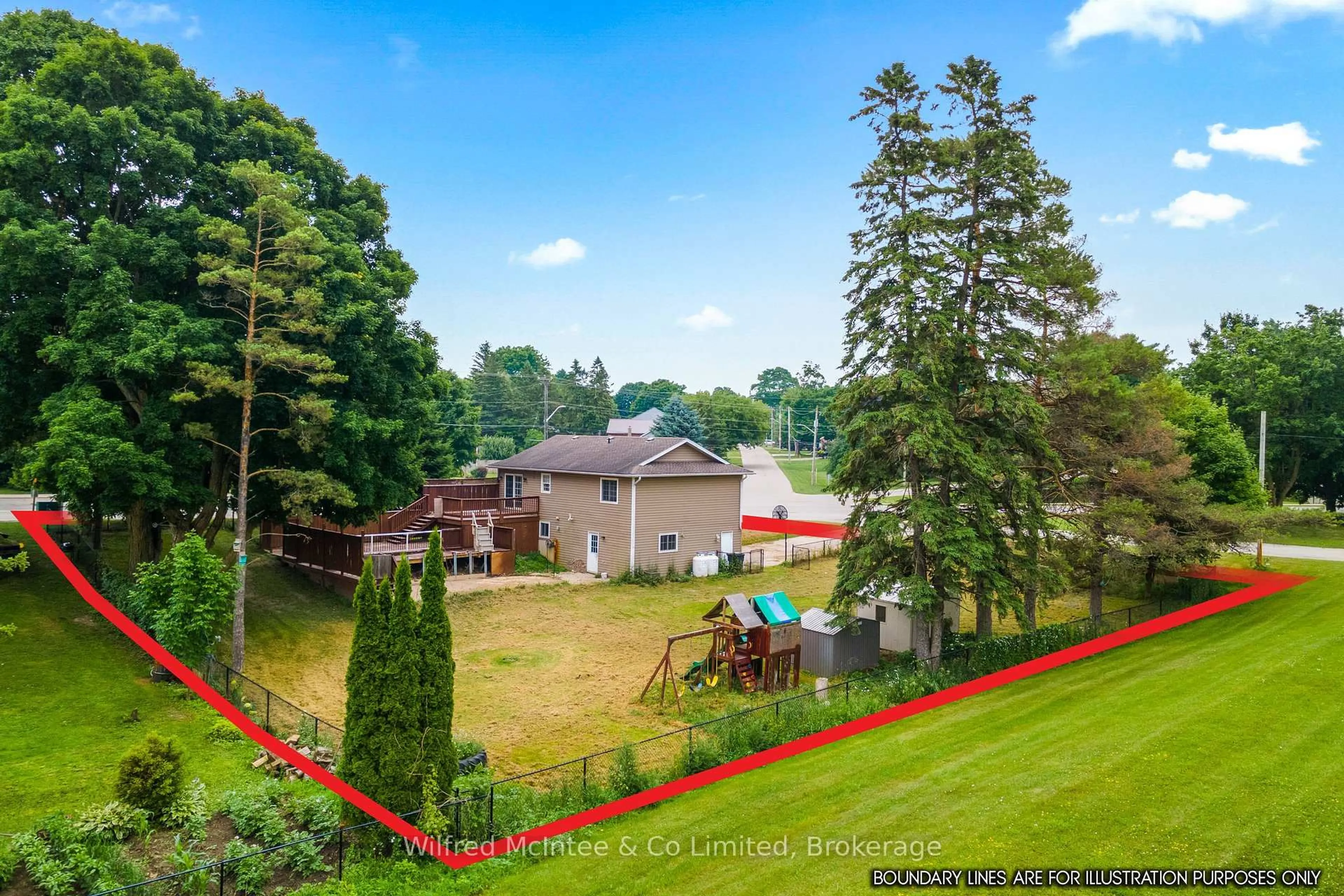 A pic from outside/outdoor area/front of a property/back of a property/a pic from drone, forest/trees view for 1057 Ann St, Howick Ontario N0G 2X0