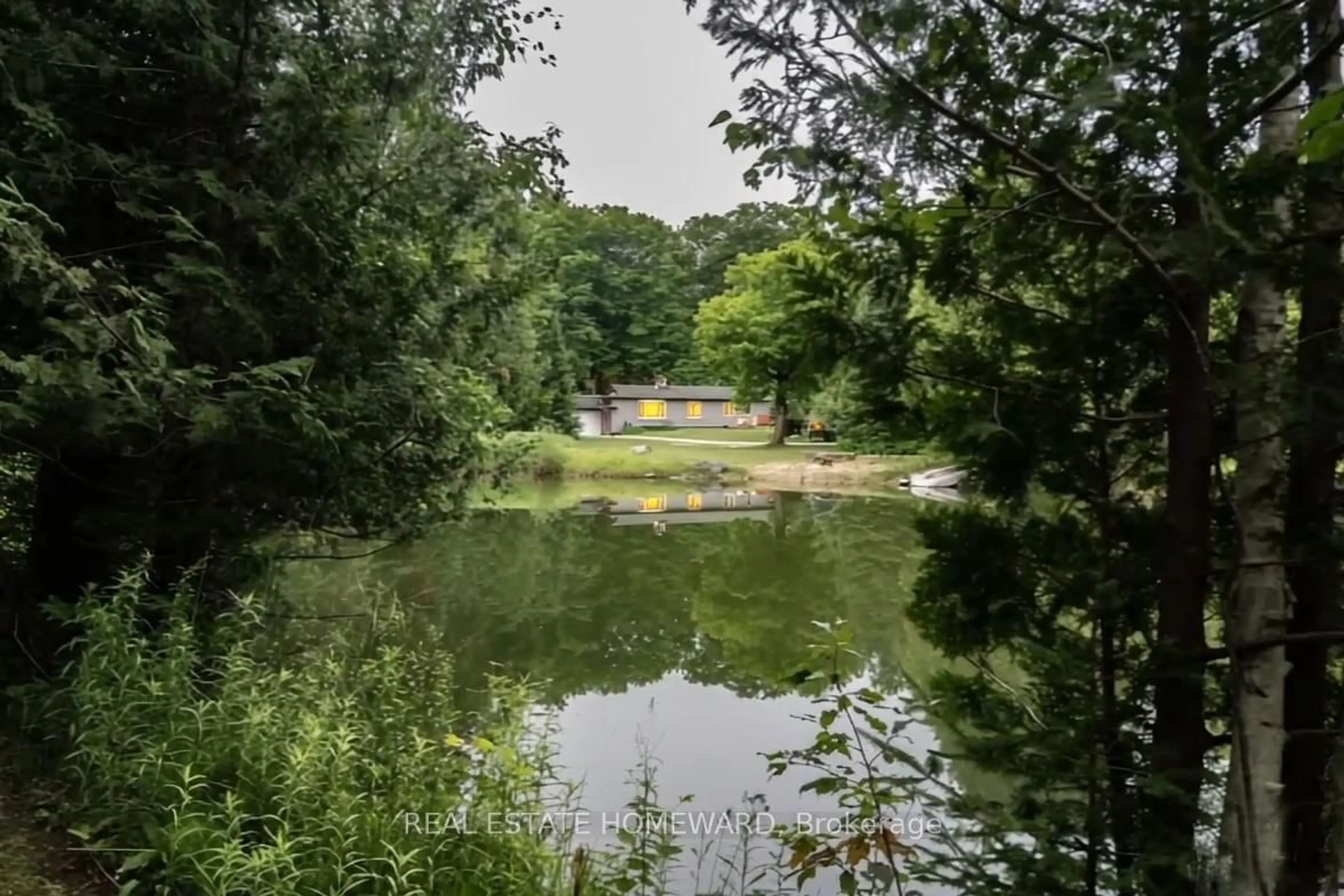 A pic from outside/outdoor area/front of a property/back of a property/a pic from drone, water/lake/river/ocean view for 607175 River Rd, Mulmur Ontario L9V 2T4