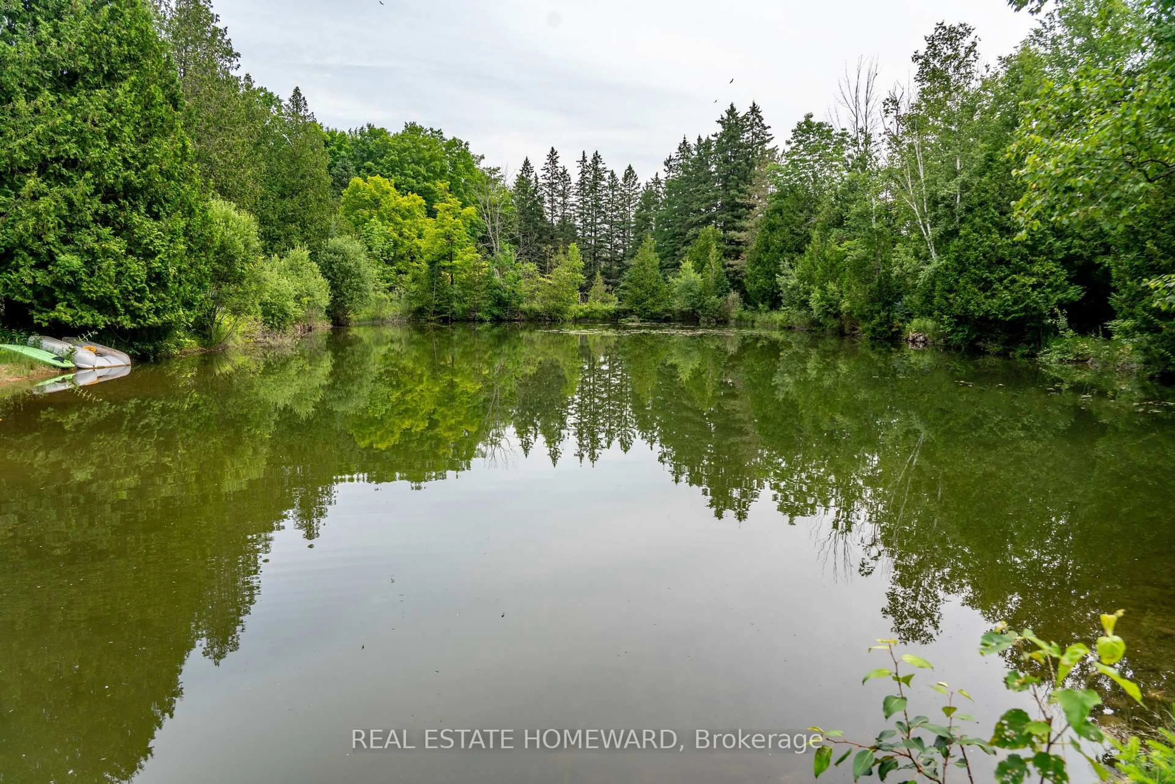 A pic from outside/outdoor area/front of a property/back of a property/a pic from drone, water/lake/river/ocean view for 607175 River Rd, Mulmur Ontario L9V 2T4