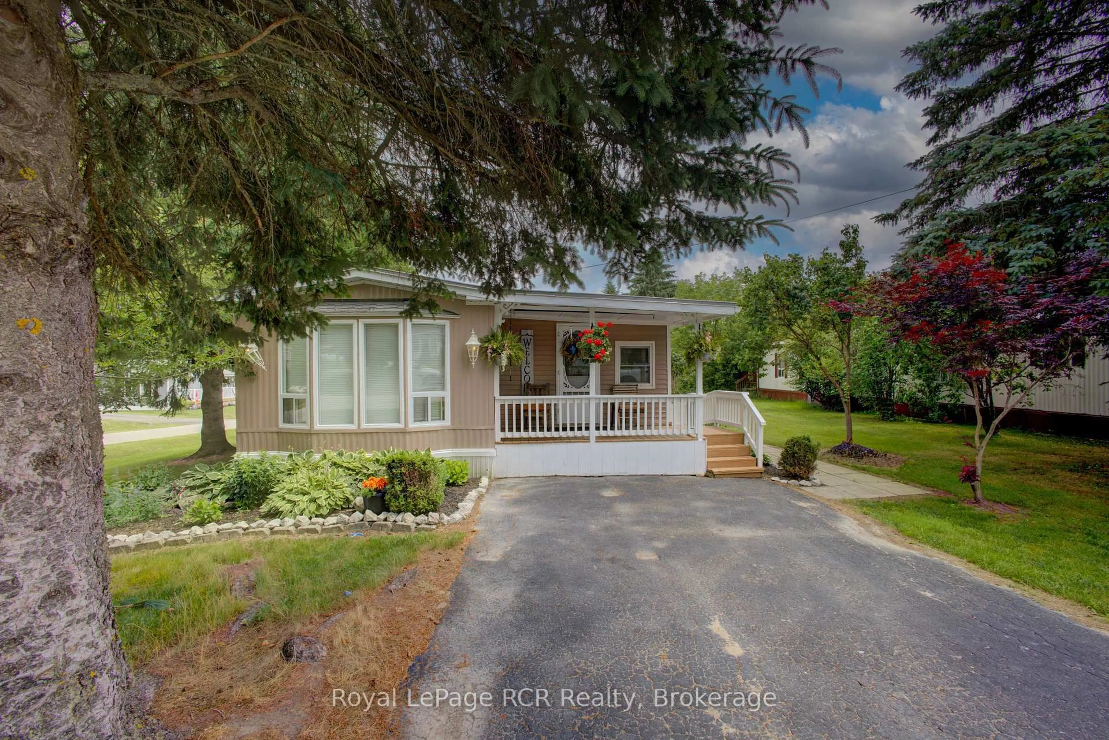 Home with vinyl exterior material, street for 5 Grand Vista Dr, Wellington North Ontario N0G 2L0