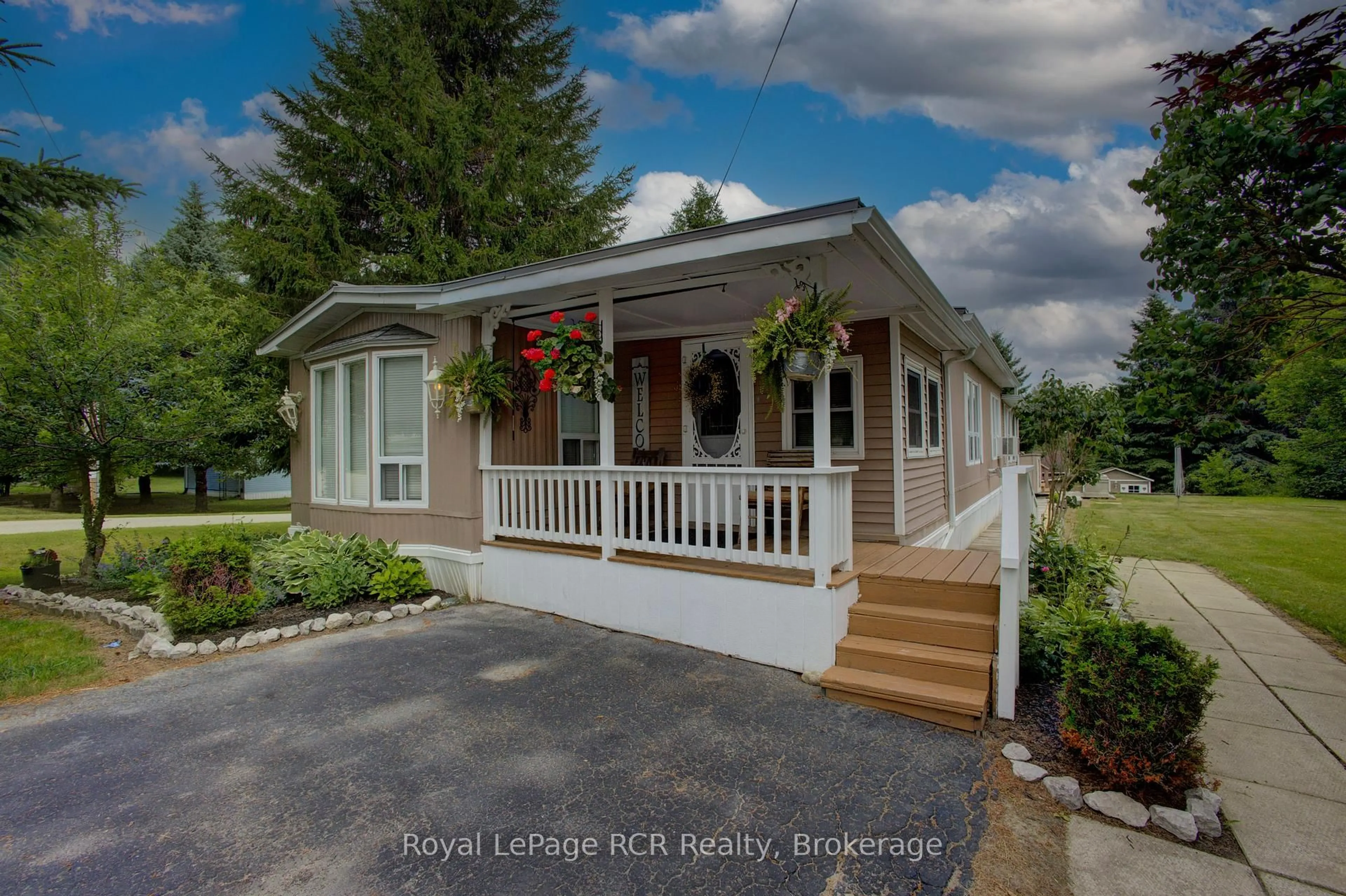Home with vinyl exterior material, street for 5 Grand Vista Dr, Wellington North Ontario N0G 2L0