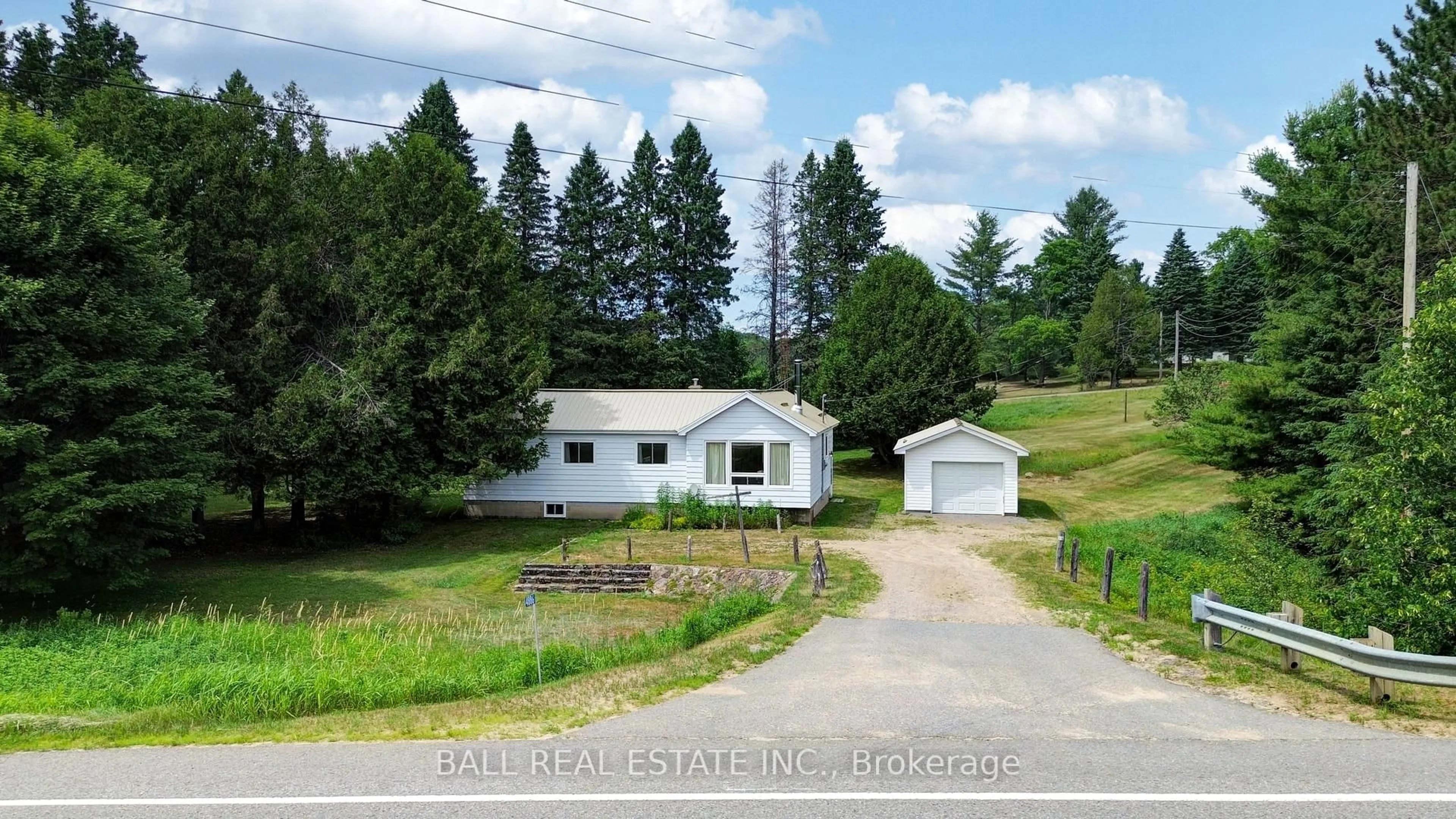 A pic from outside/outdoor area/front of a property/back of a property/a pic from drone, street for 4886 Highway 620, Coe Hill Ontario K0L 1P0