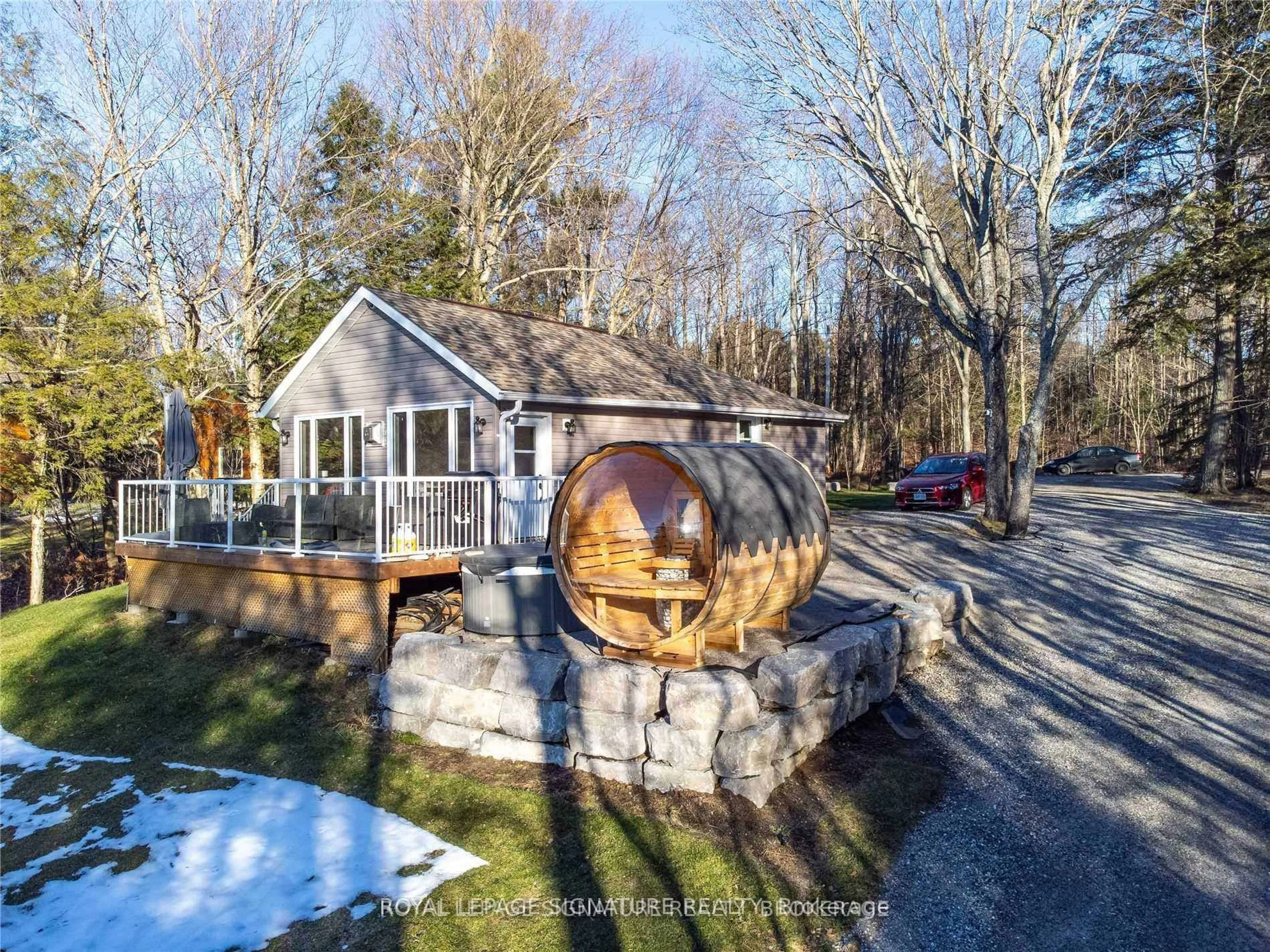 A pic from outside/outdoor area/front of a property/back of a property/a pic from drone, street for 1051 Norley Dr, Algonquin Highlands Ontario K0M 1J1