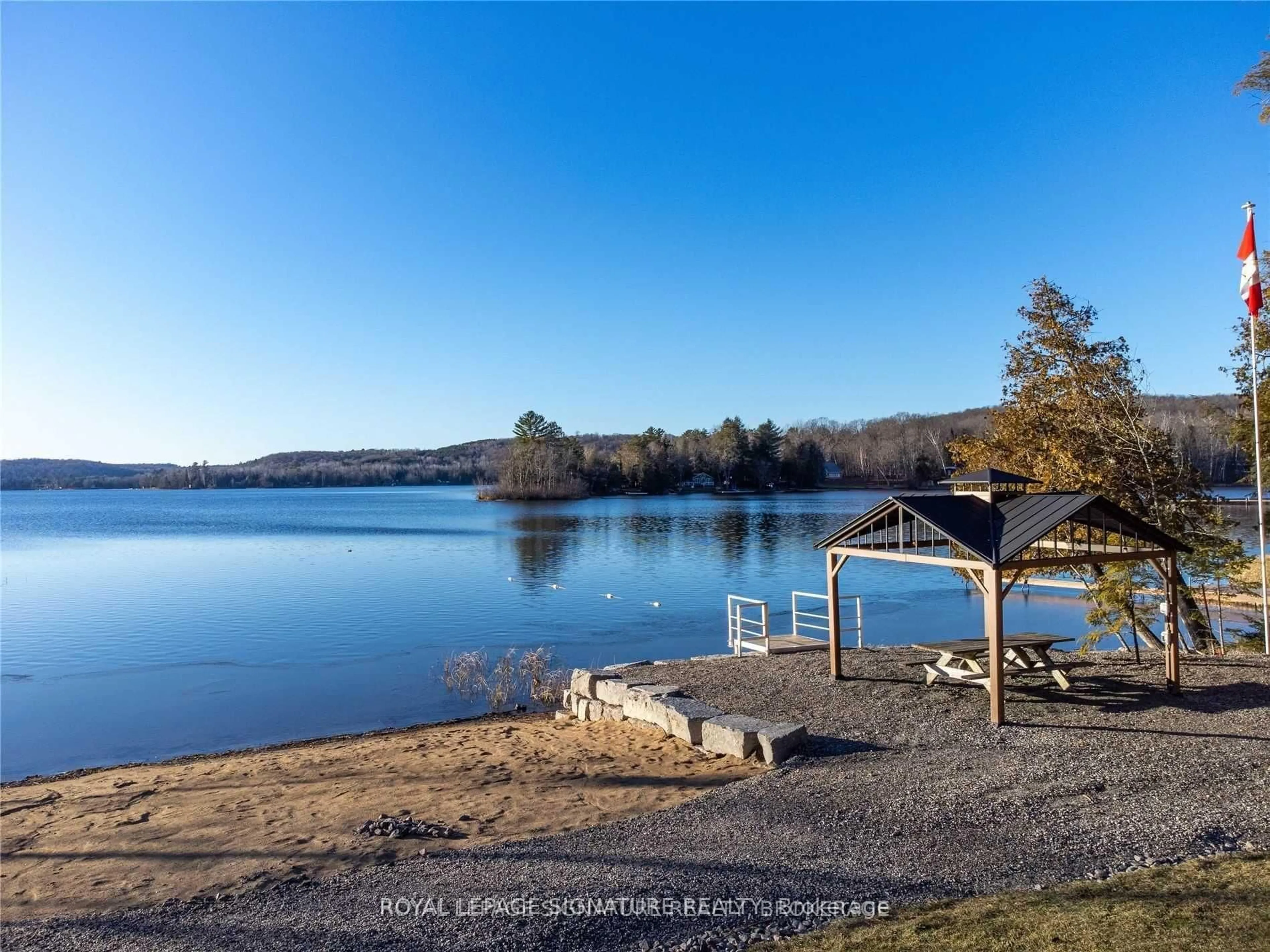 A pic from outside/outdoor area/front of a property/back of a property/a pic from drone, water/lake/river/ocean view for 1051 Norley Dr, Algonquin Highlands Ontario K0M 1J1