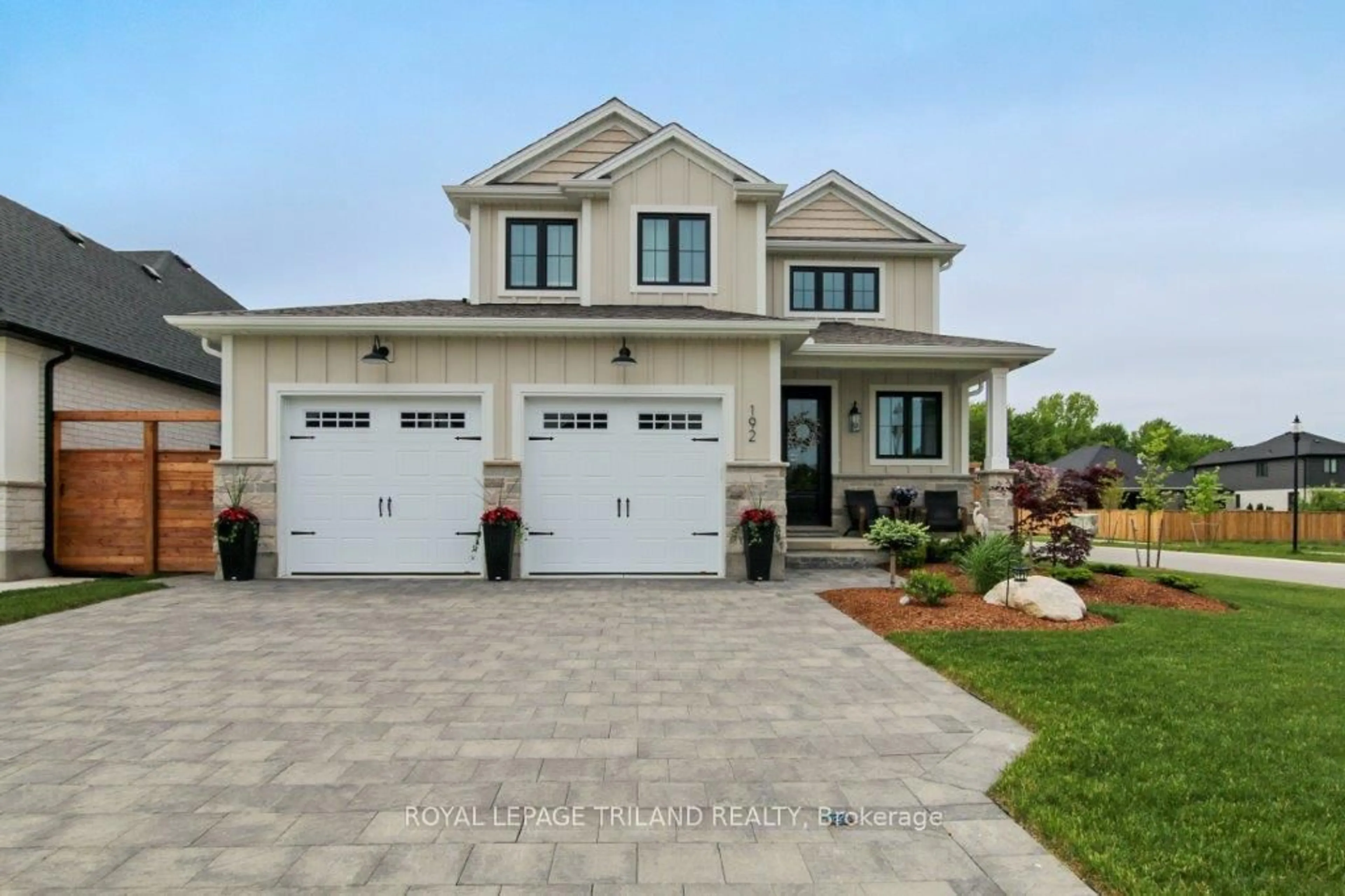 Home with vinyl exterior material, street for 192 Foxborough Pl, Thames Centre Ontario N0M 2P0