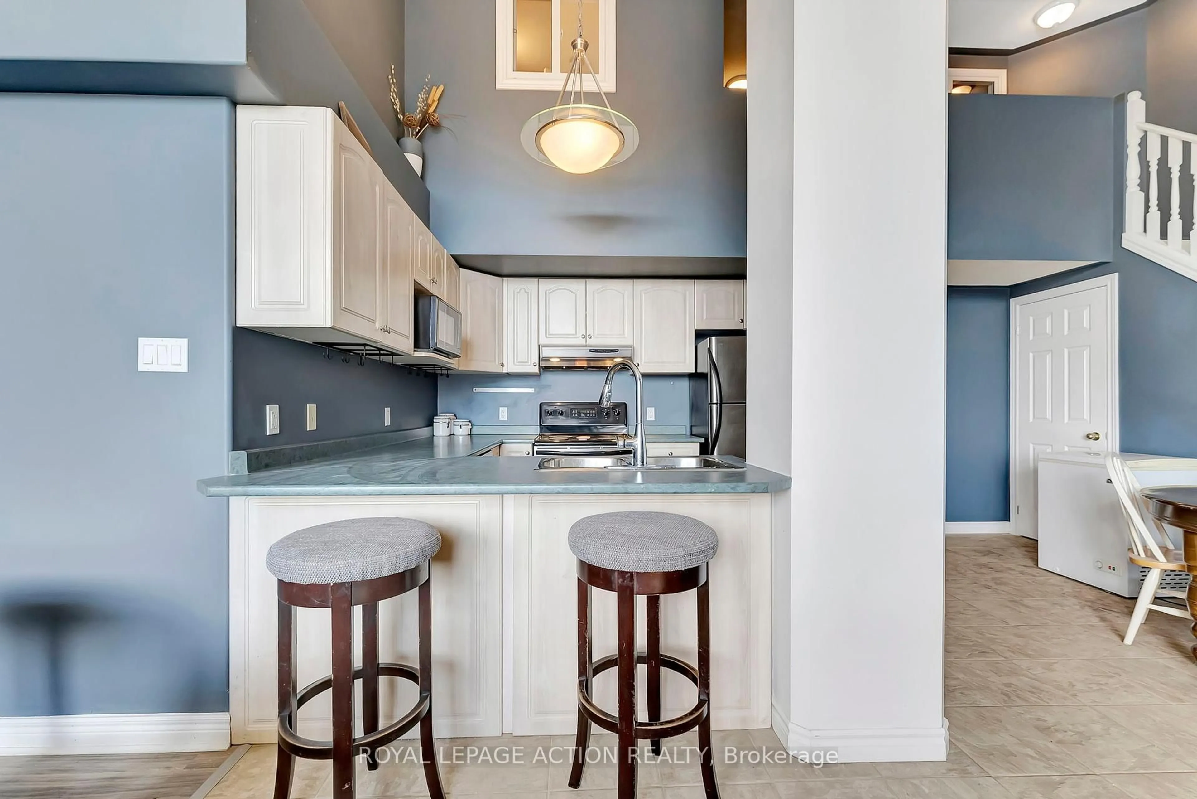 Open concept kitchen, ceramic/tile floor for 111 Grey St #212, Brantford Ontario N3S 4V8