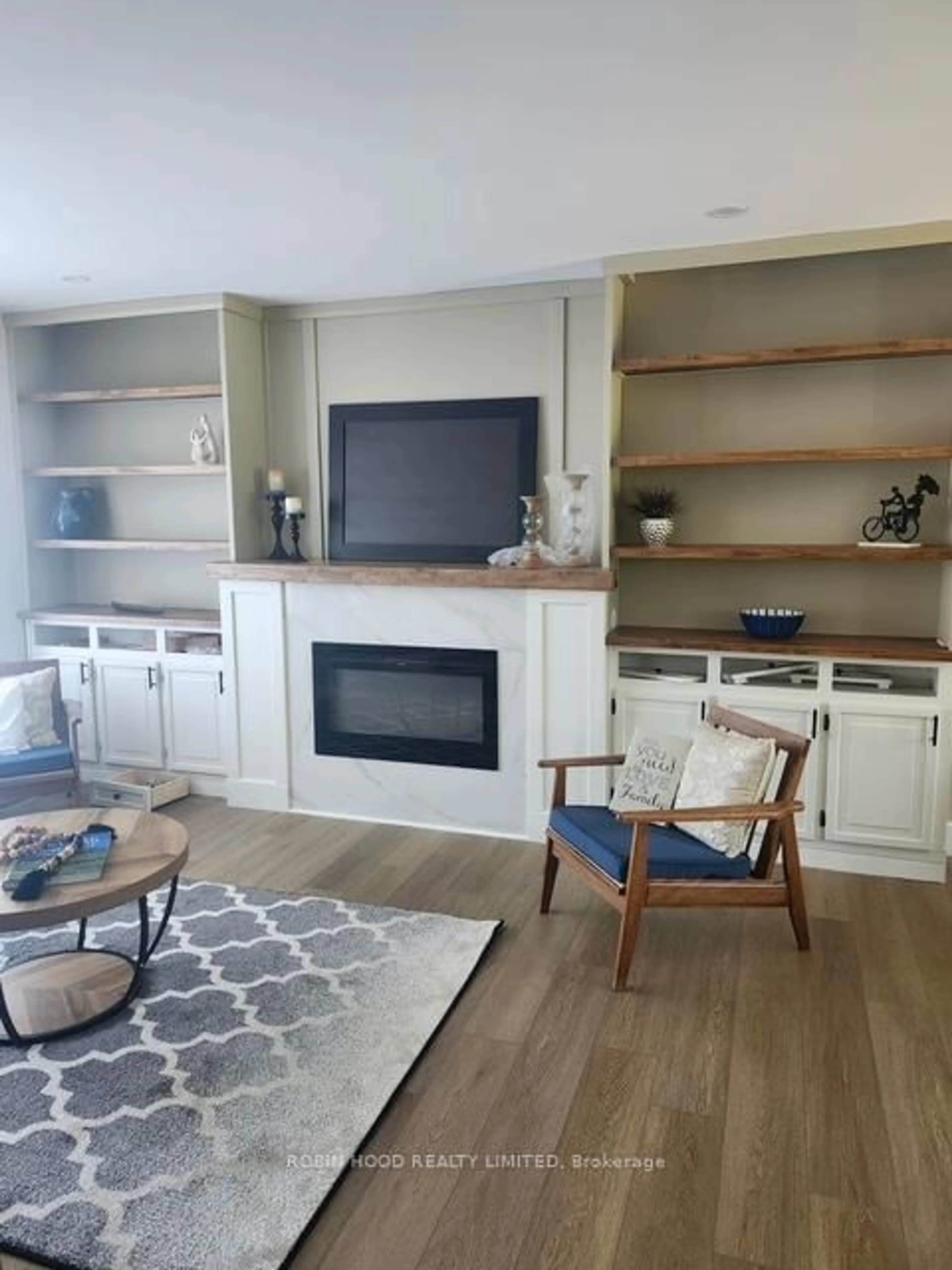 Living room with furniture, wood/laminate floor for 6259 Poplar St-Gu St #6259, South Glengarry Ontario K0C 1E0