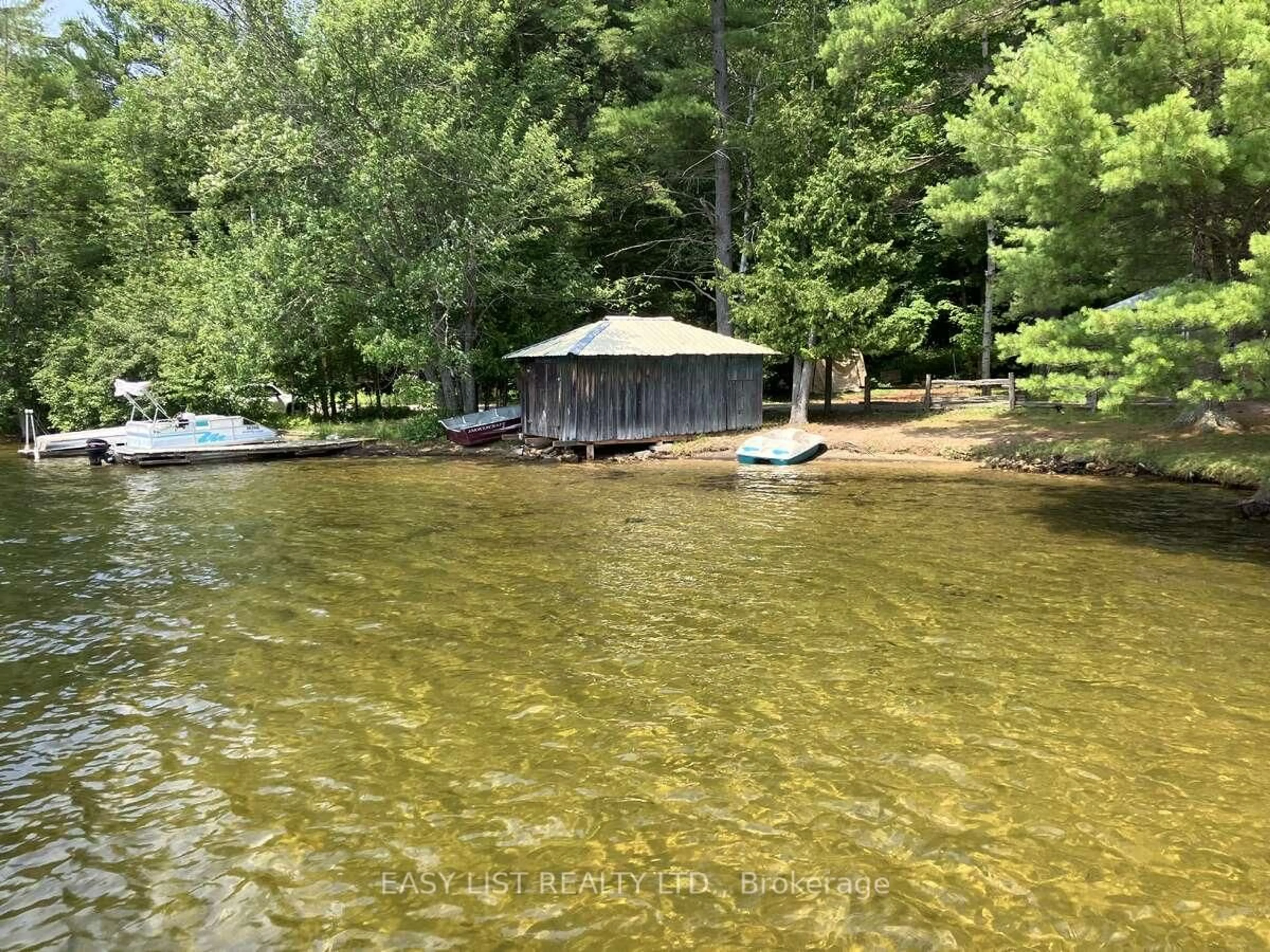 A pic from outside/outdoor area/front of a property/back of a property/a pic from drone, water/lake/river/ocean view for 1045 Reynolds Rd, Minden Hills Ontario K0M 2K0