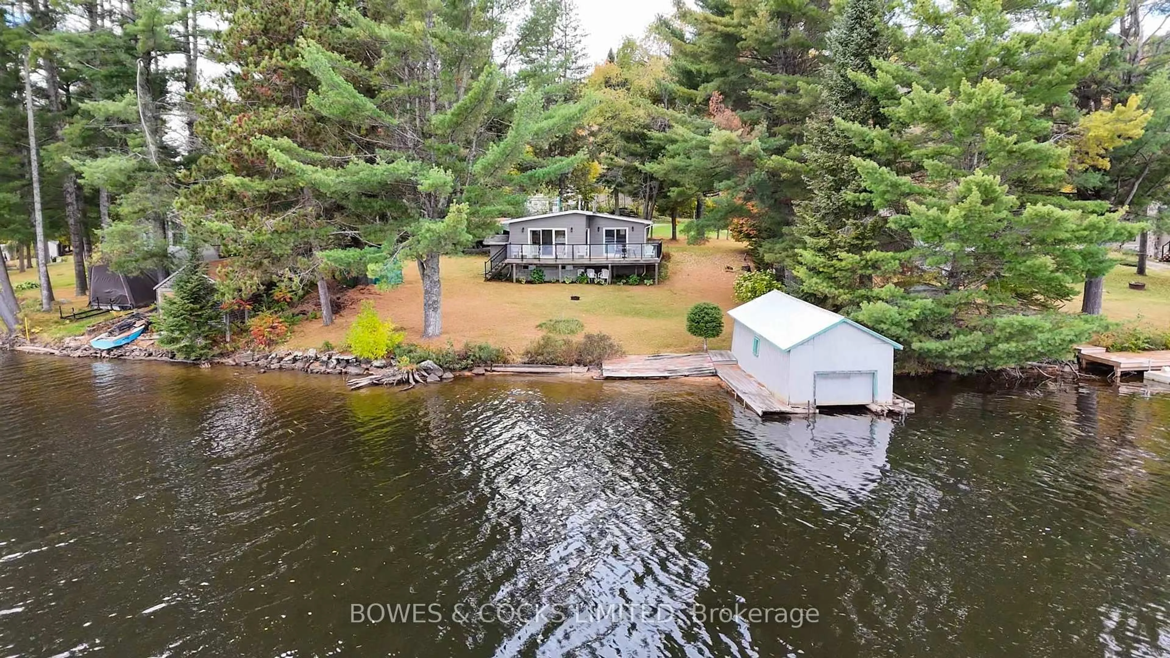A pic from outside/outdoor area/front of a property/back of a property/a pic from drone, water/lake/river/ocean view for 63 O-At-Ka Rd, Bancroft Ontario K0L 1C0
