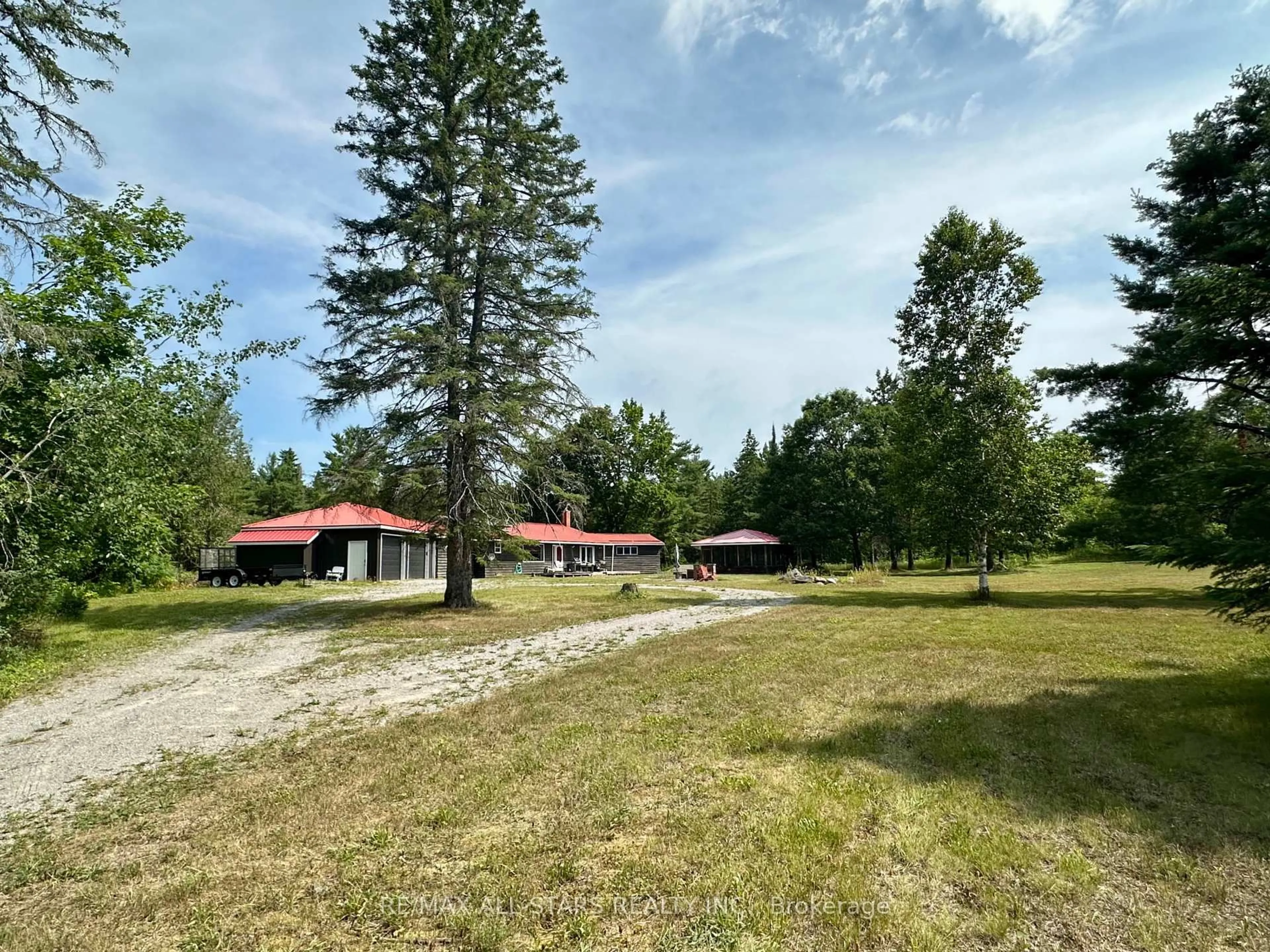 A pic from outside/outdoor area/front of a property/back of a property/a pic from drone, unknown for 380 Ledge Rd, Trent Lakes Ontario K0M 1A0