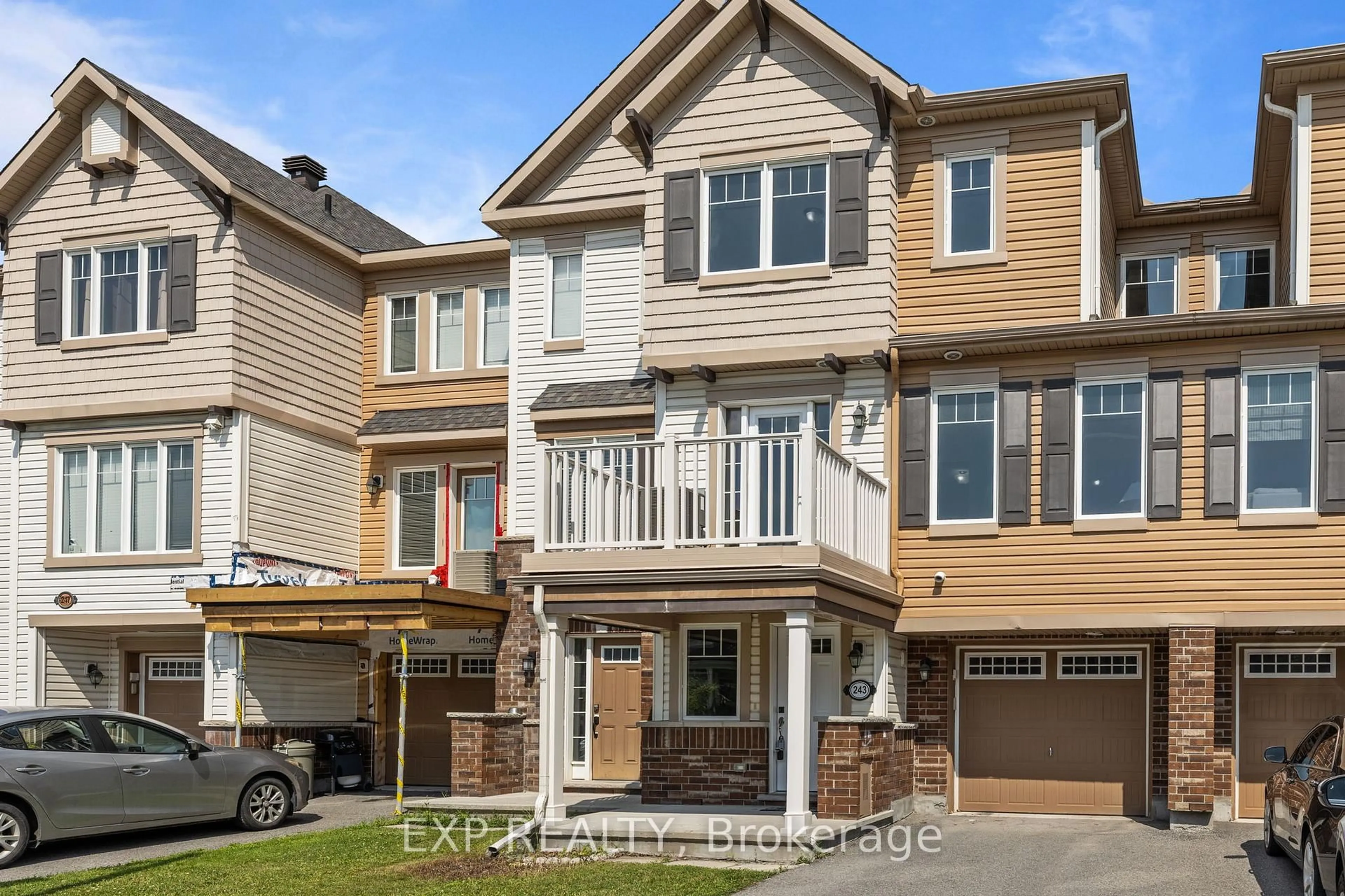 Home with vinyl exterior material, street for 243 Par-La-Ville Circ, Ottawa Ontario K2S 0T6