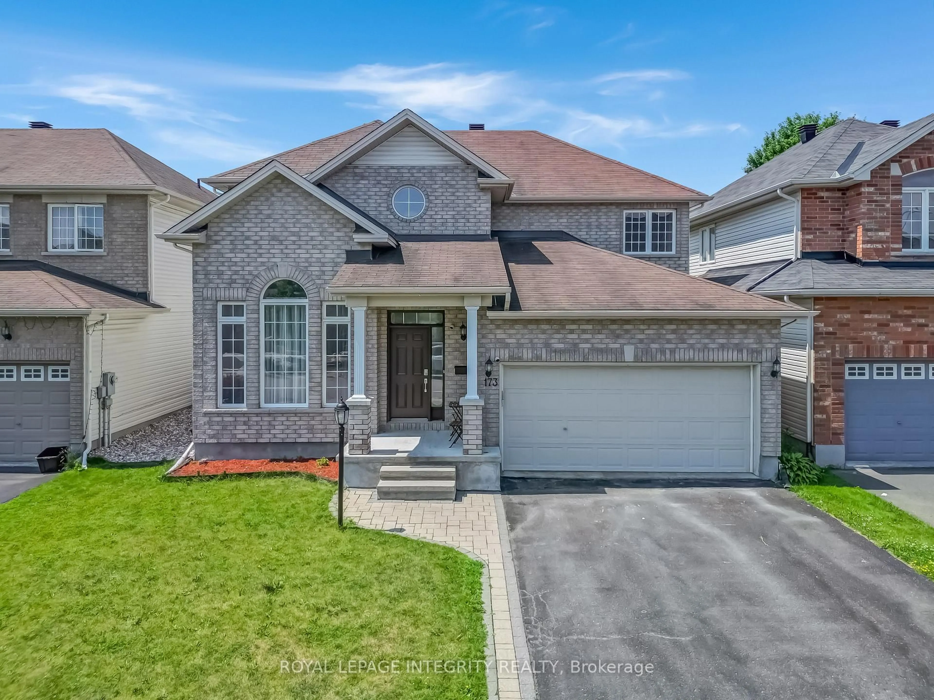 Home with brick exterior material, street for 173 Lamplighters Dr, Ottawa Ontario K2J 0K9