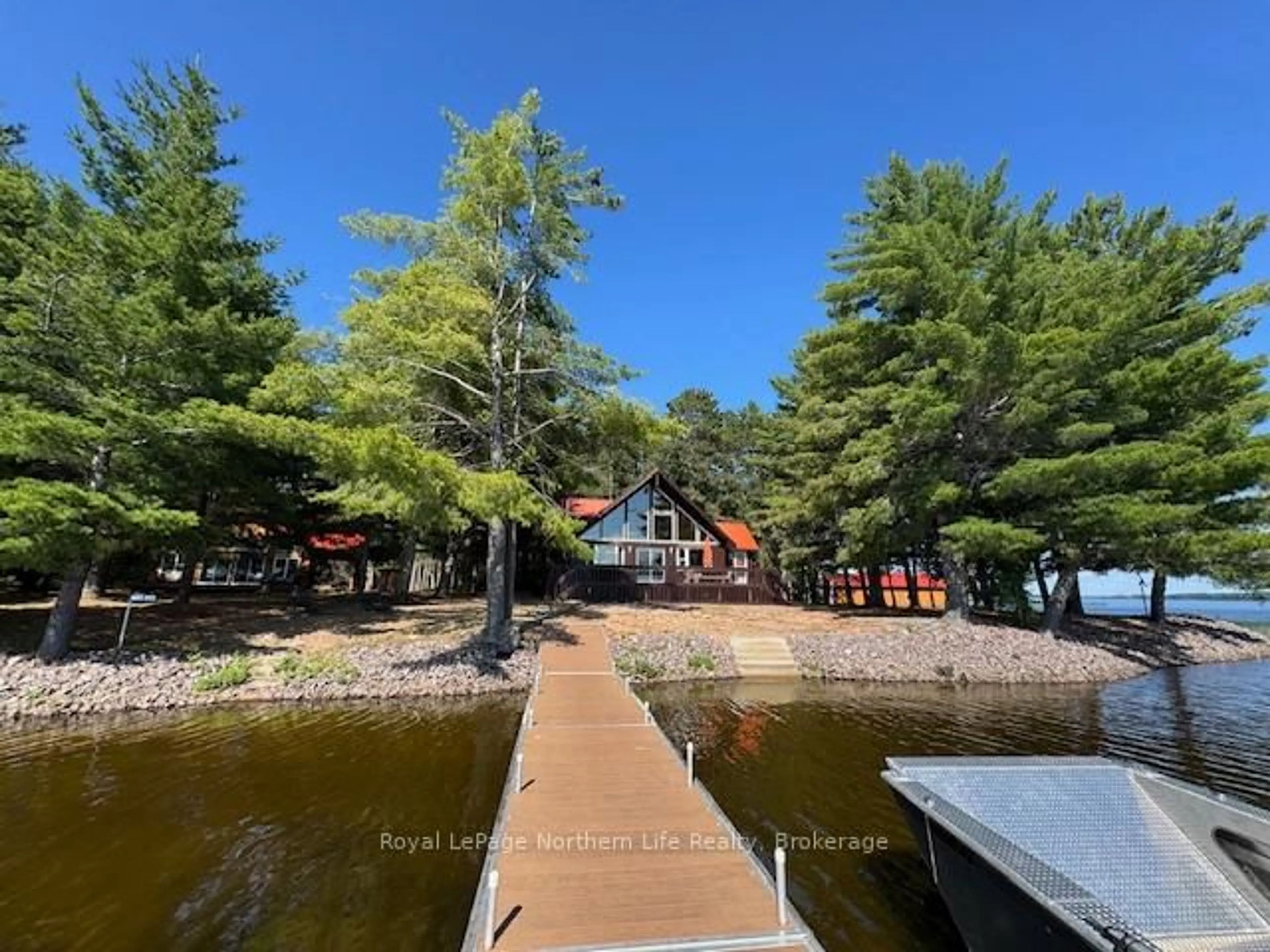 A pic from outside/outdoor area/front of a property/back of a property/a pic from drone, water/lake/river/ocean view for 693 Sandy Island, West Nipissing Ontario P1B 8G5