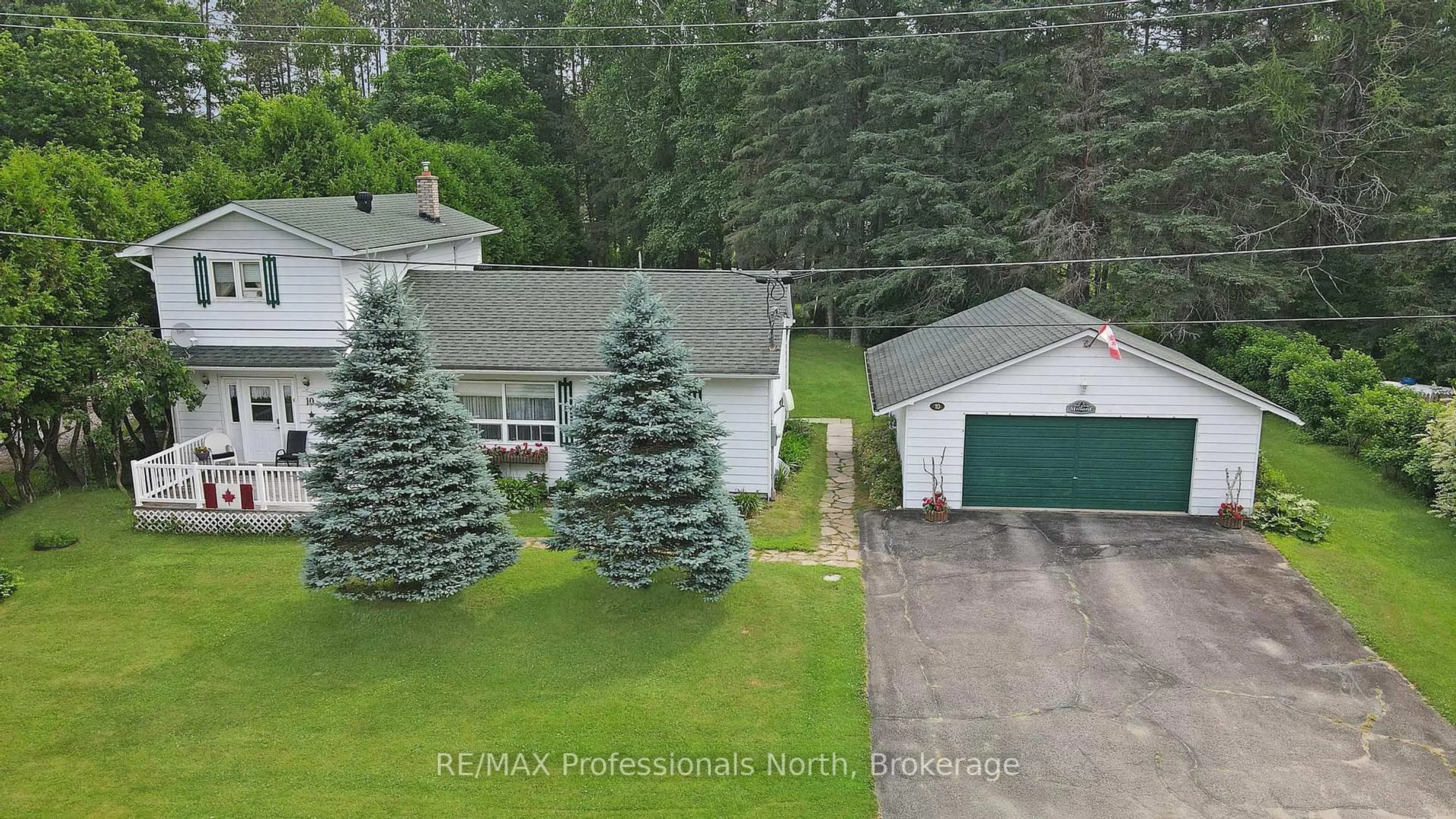 A pic from outside/outdoor area/front of a property/back of a property/a pic from drone, street for 10 Stouffer St, Minden Hills Ontario K0M 2K0