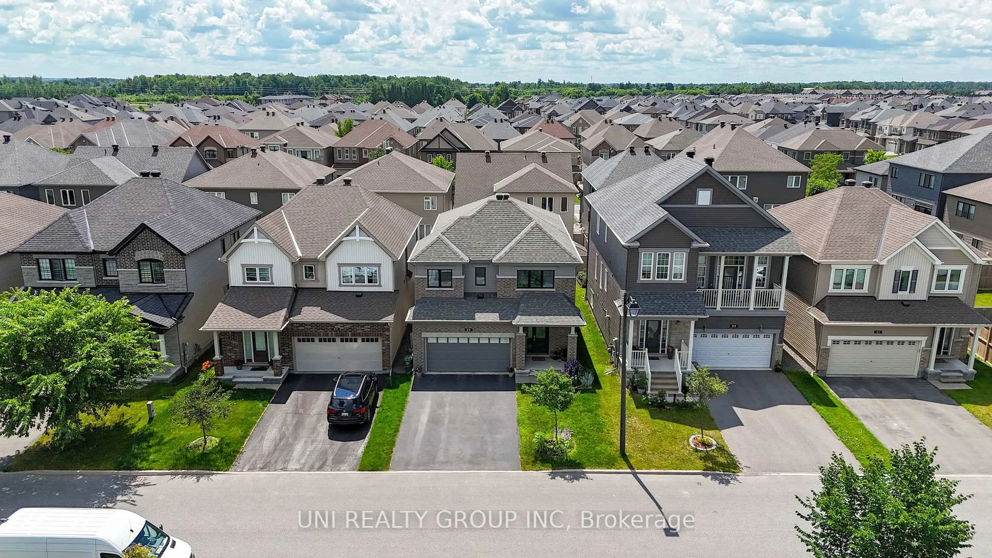 A pic from outside/outdoor area/front of a property/back of a property/a pic from drone, street for 25 CLONFADDA Terr, Ottawa Ontario K2J 6E7