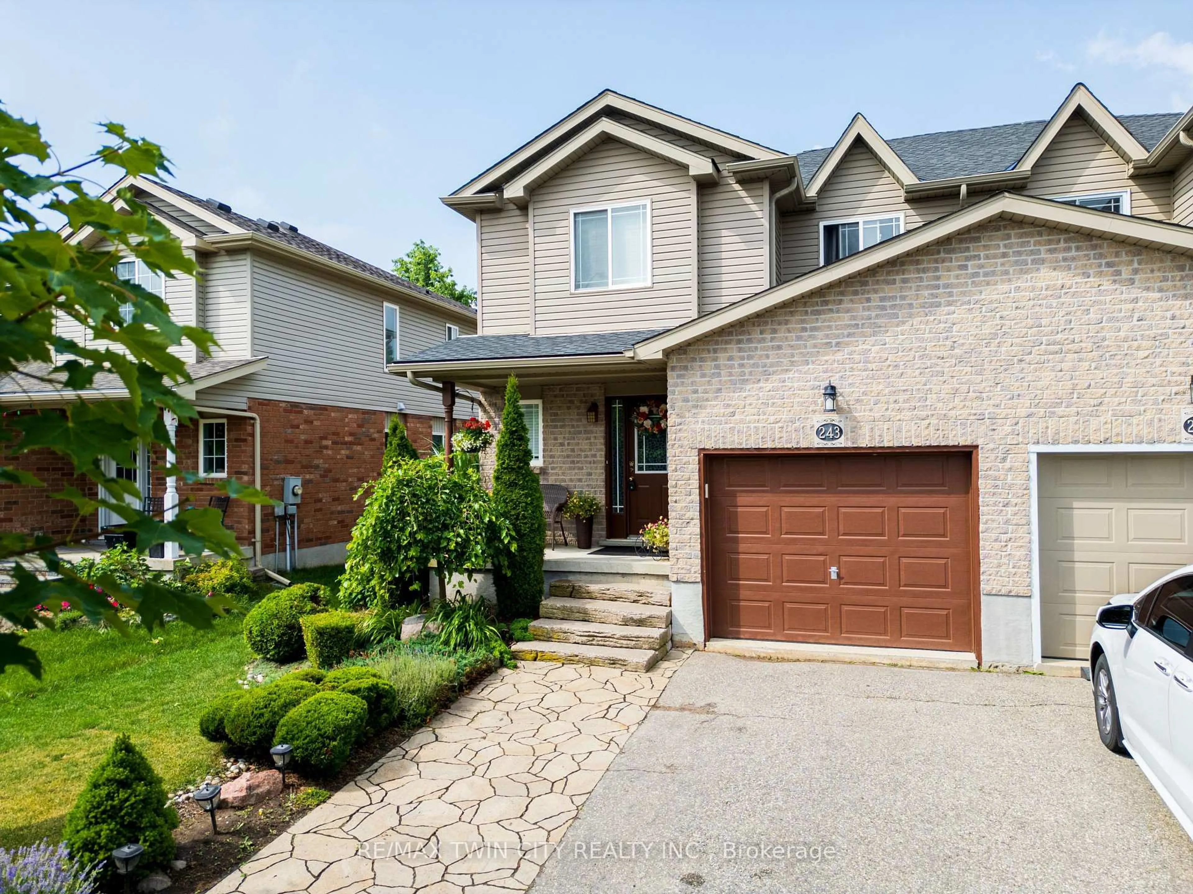 Home with brick exterior material, street for 243 Brenneman Dr, Wilmot Ontario N3A 4N2