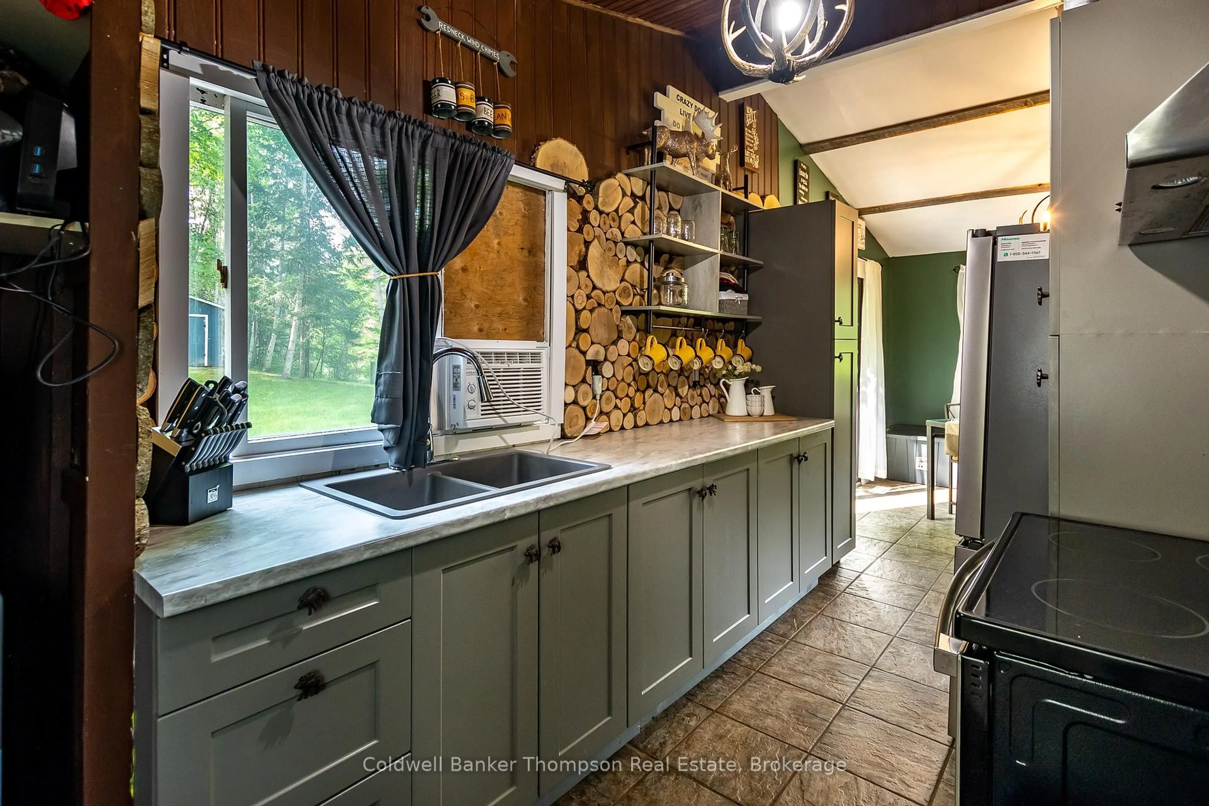 Rustic kitchen, ceramic/tile floor for 63 Woodland Lane, Kearney Ontario P0A 1M0